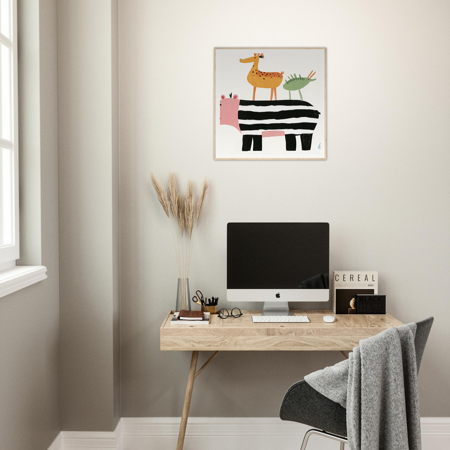Simple wooden desk with iMac, perfect for stylish nursery decor and framed poster ideas