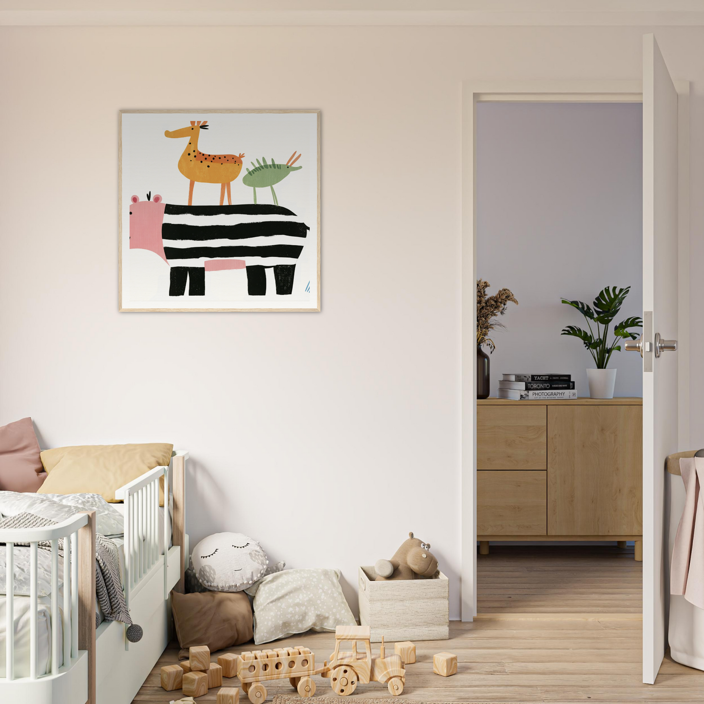 Whimsical nursery wall art featuring stacked animals for fun nursery decor