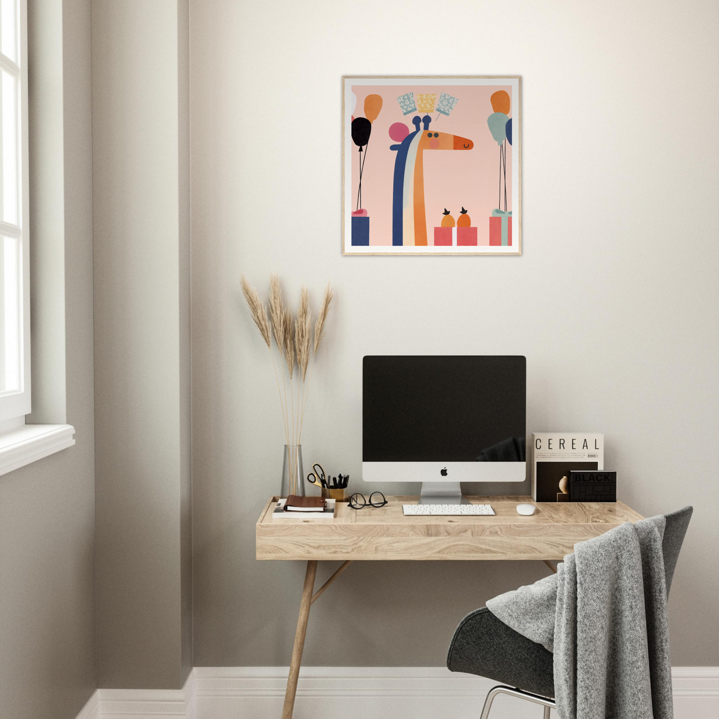 Minimalist wooden desk with iMac, perfect for nursery decor and framed poster displays