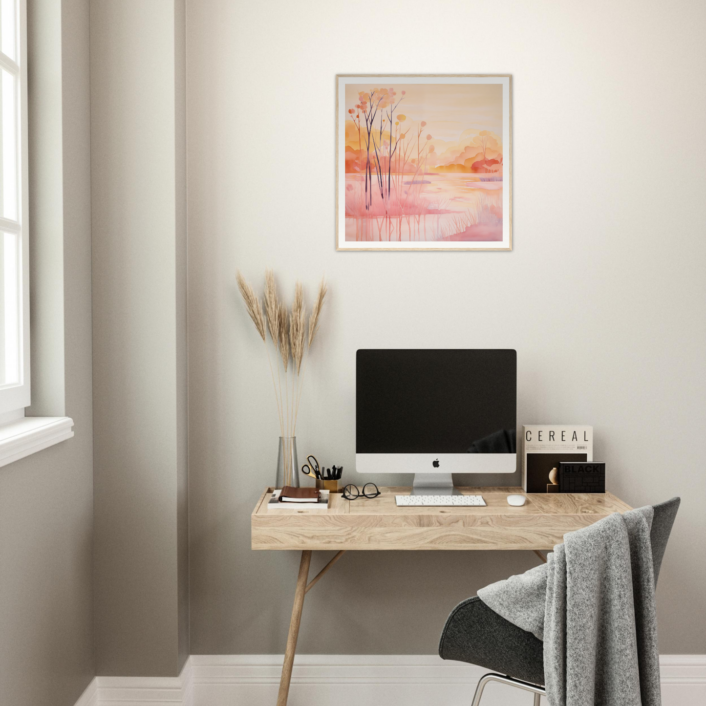 Minimalist wooden desk with iMac and nursery wall art above in Product22 setup