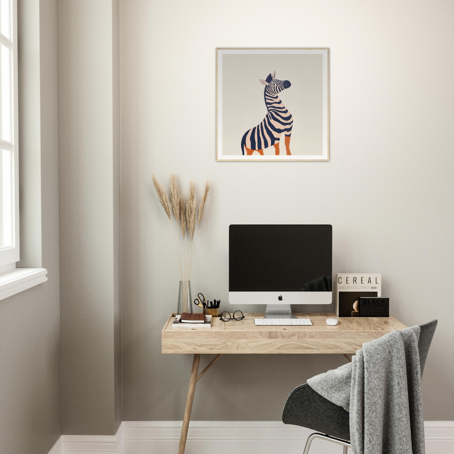 Minimalist wooden desk with iMac and zebra nursery wall art above in product234