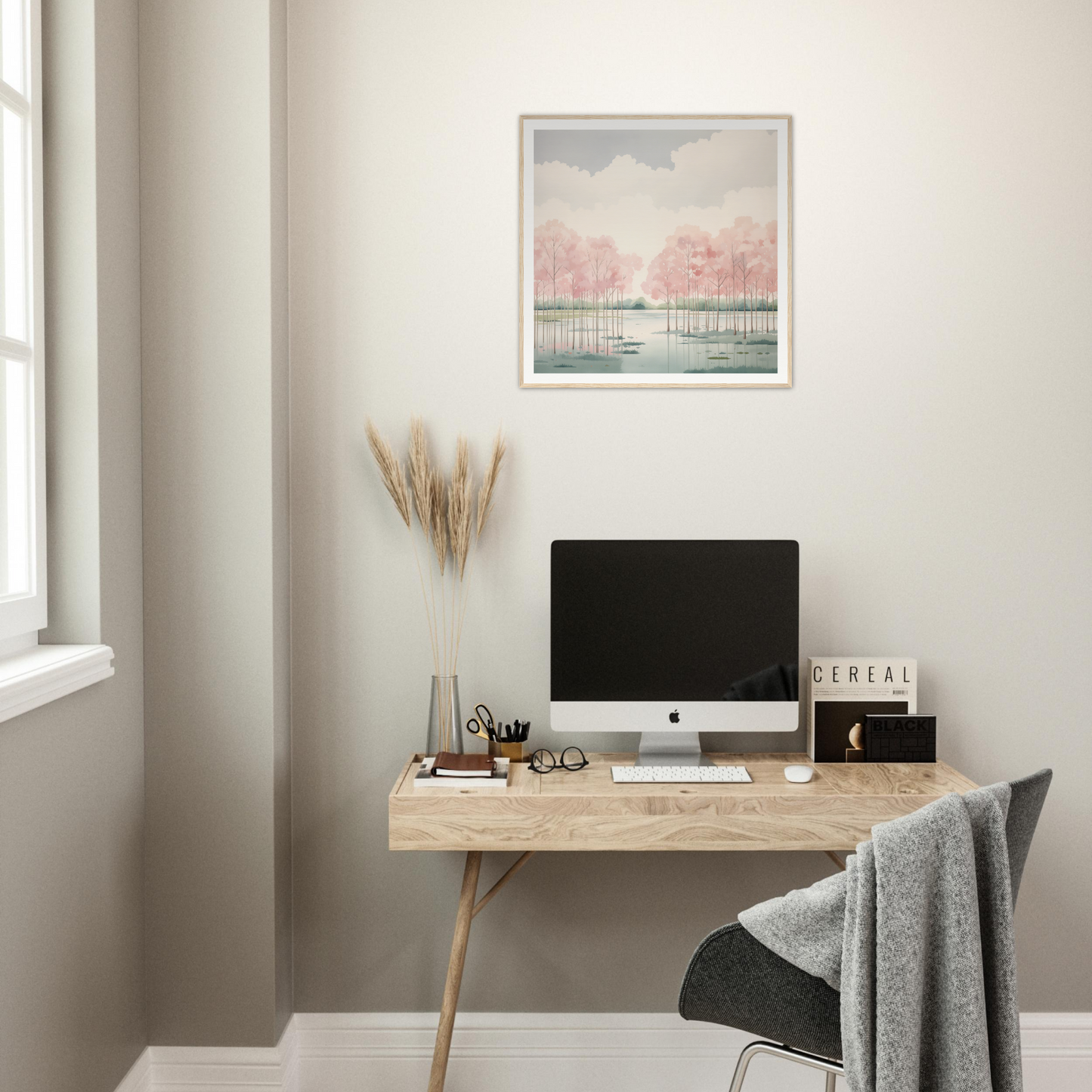 Wooden desk with iMac and minimalist decor, perfect for stylish nursery wall art