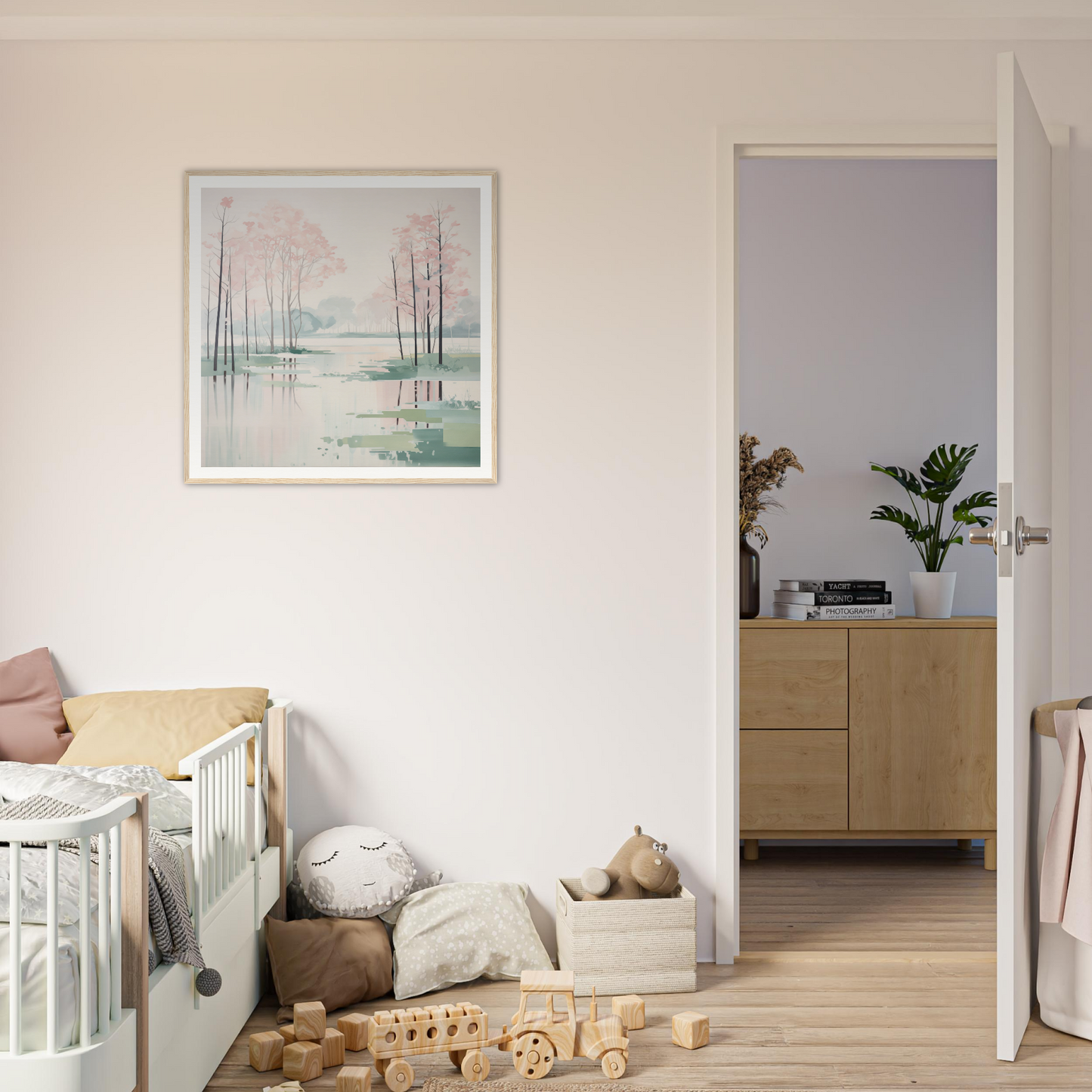 Cozy White Wooden Crib with Curved Railings Perfect for Nursery Decor and Framed Posters
