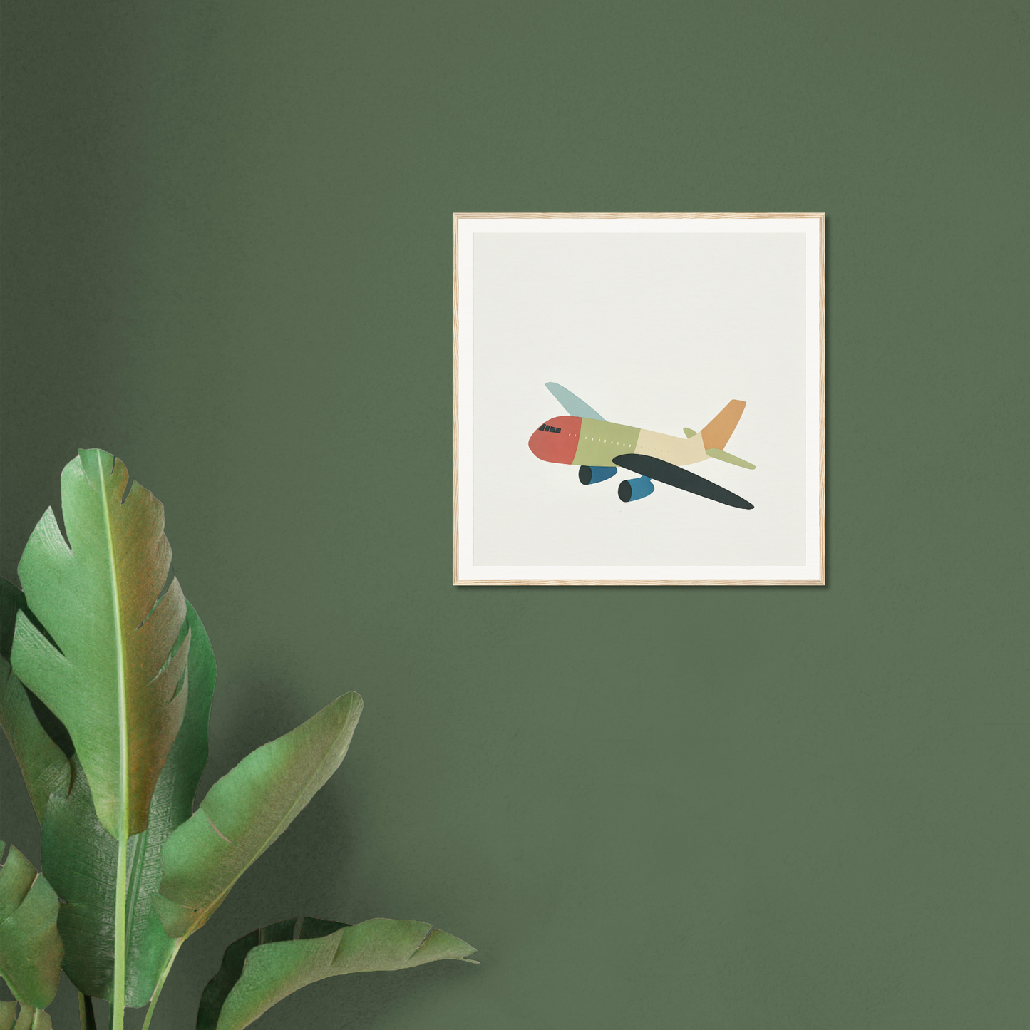 Framed poster featuring minimalist airplane art in coral and yellow for nursery decor