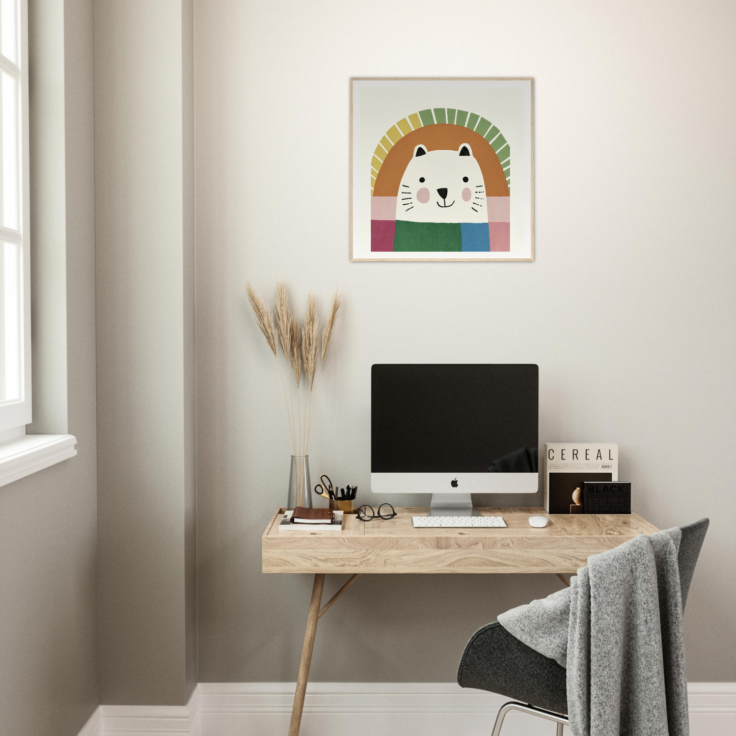 Minimalist wooden desk with iMac and decorative cat artwork above in Psychedelic Bear Symphony