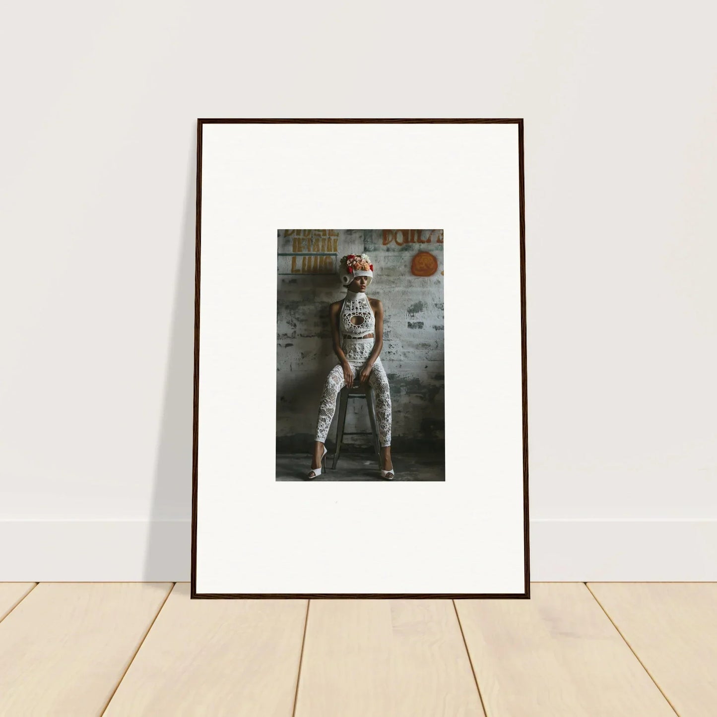 Framed wall art of a person in a spacesuit, perfect for dream loom room decor