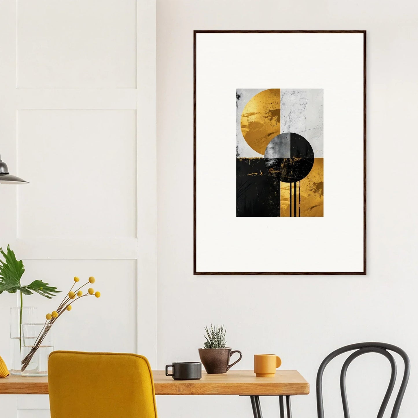 Framed wall art of geometric shapes in yellow, black, and gray for golden dreams room decor