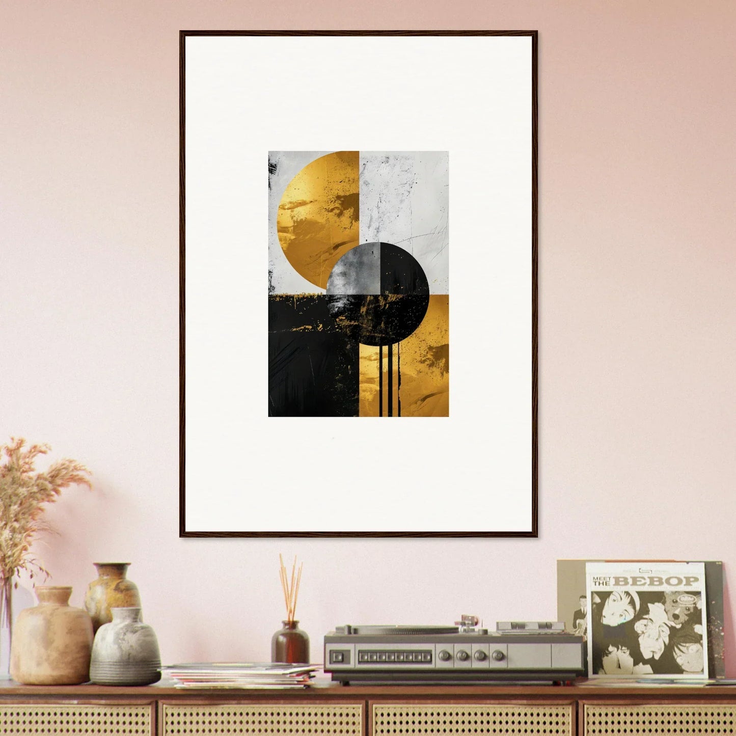 Framed wall art of geometric shapes in gold, black, and white for Golden Dreams room decor