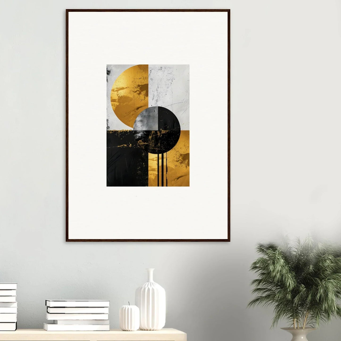 Framed wall art of geometric shapes in gold, black, and white for golden dreams room decor