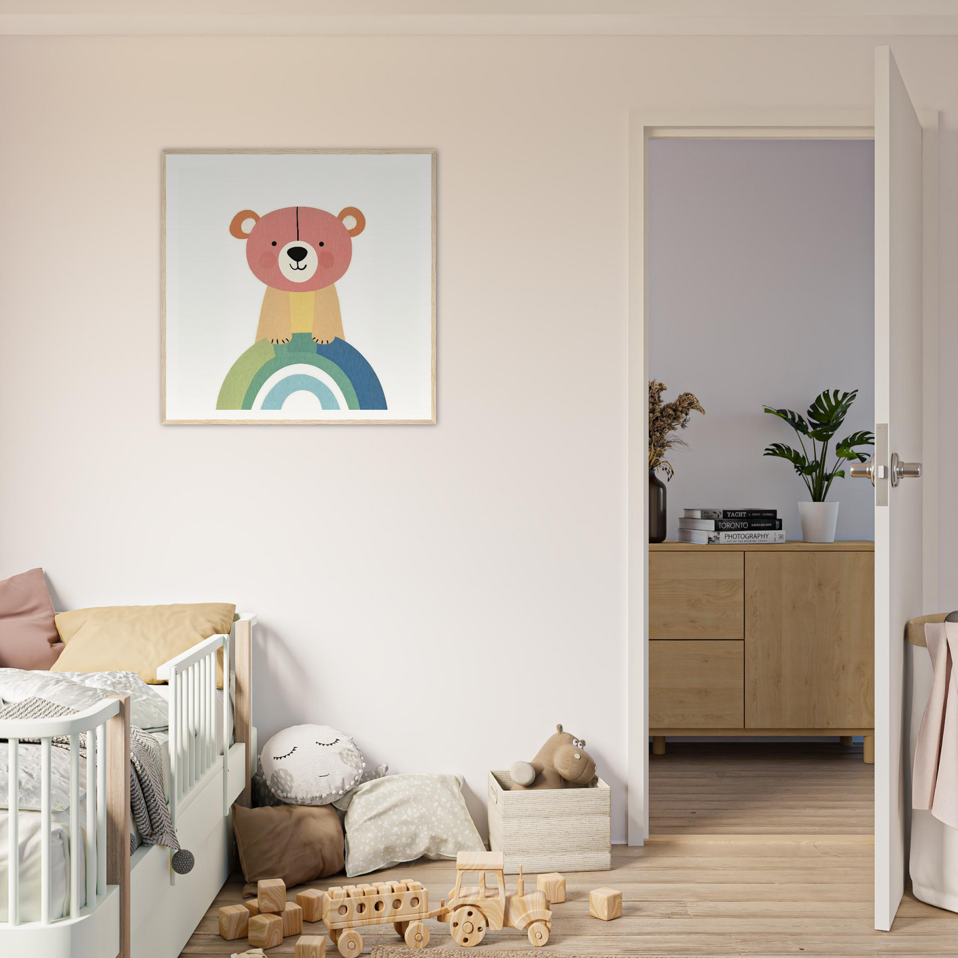 Framed special edition art of a smiling bear on a vibrant rainbow background