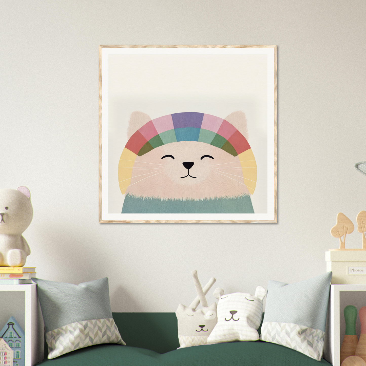 Framed artwork of a smiling cartoon bear with a rainbow-striped hat from Rainbow Cat Reverie