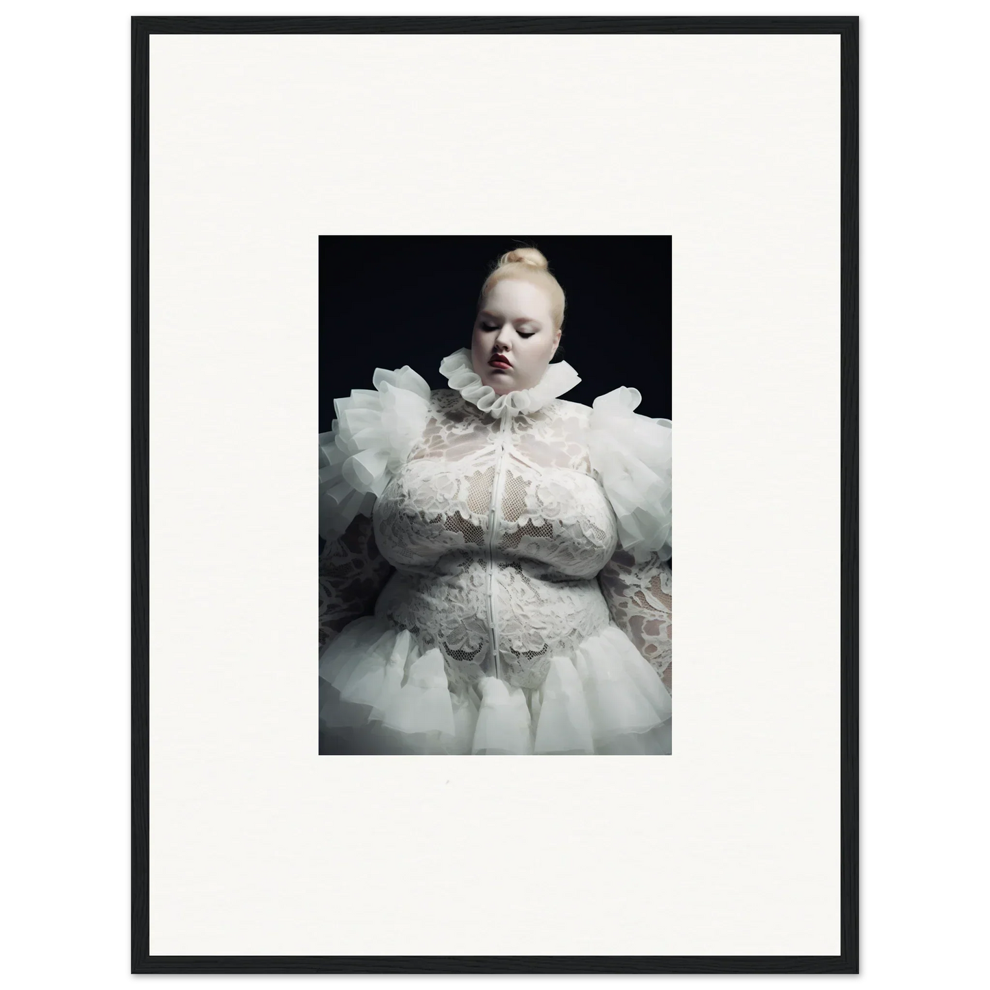 Pale figure in an elaborate white ruffled costume against a dark background.