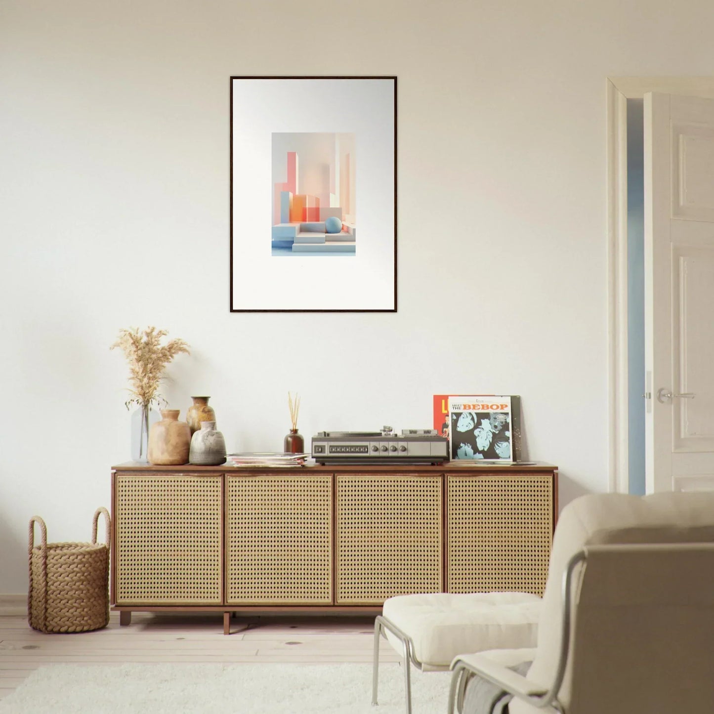 Stylish wooden sideboard with cane-webbed doors and decorative items for chic room decoration