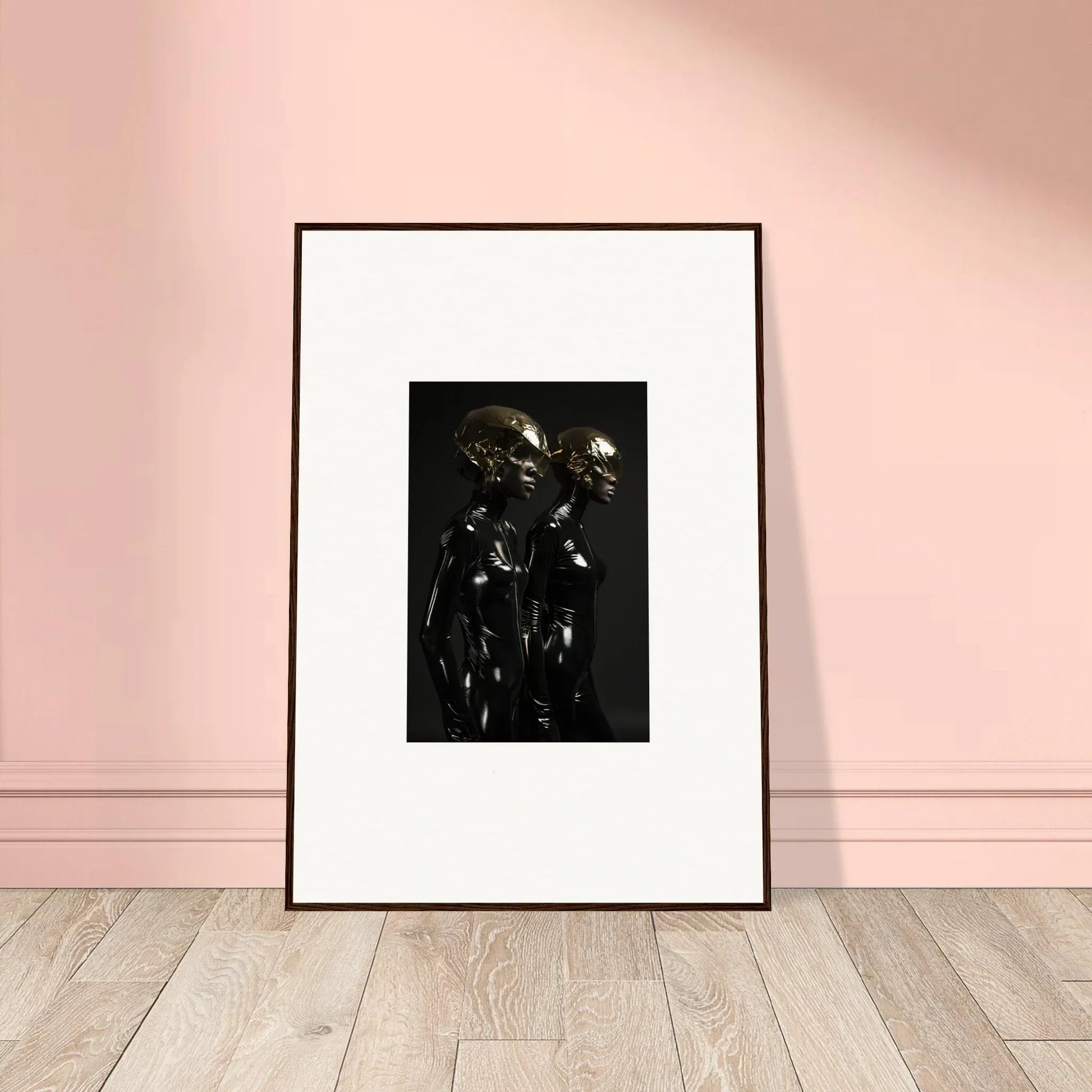 Framed black and white photograph depicting two figures in dark, reflective attire.