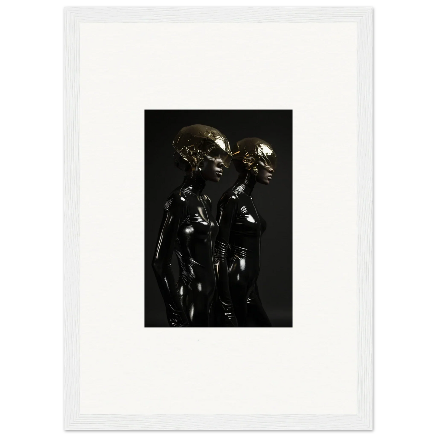 Dark metallic sculpture depicting two figures standing close together.