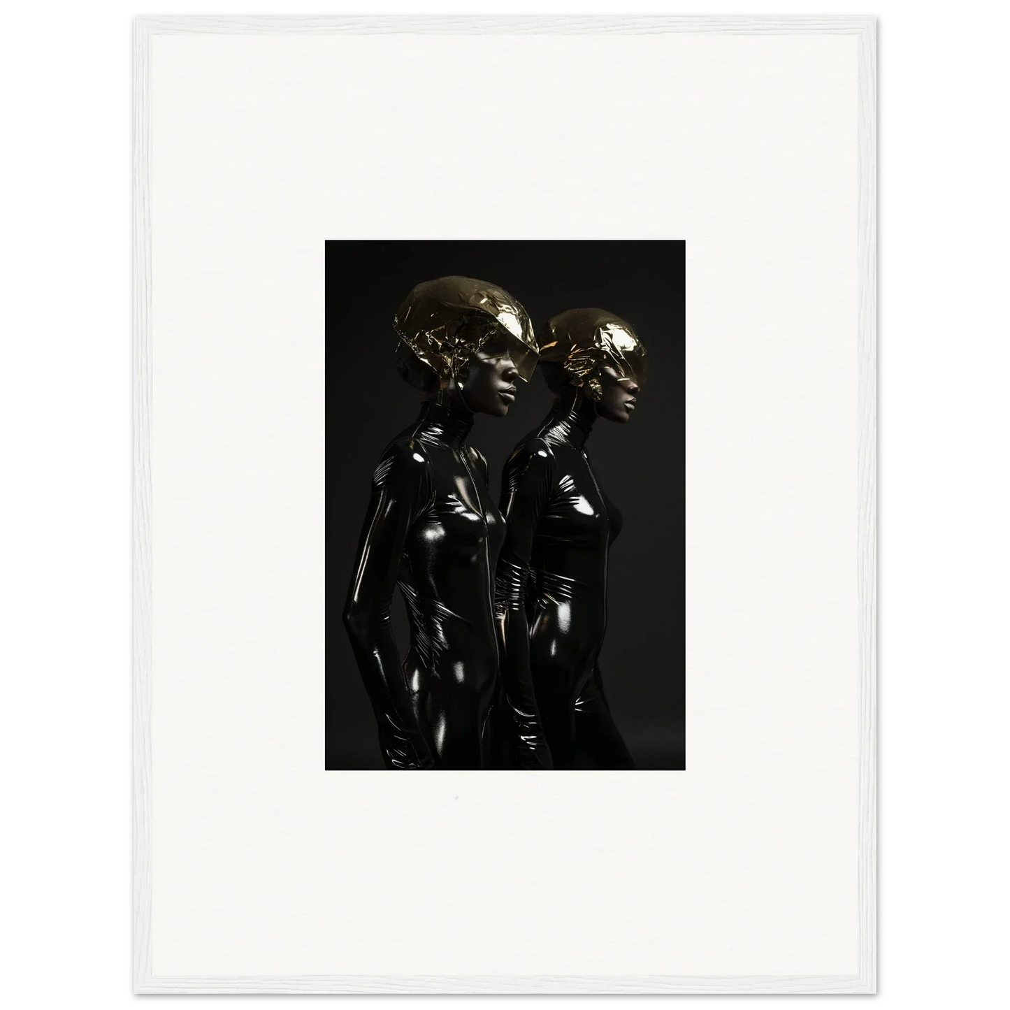 Dark metallic sculpture depicting two humanoid figures standing close together.