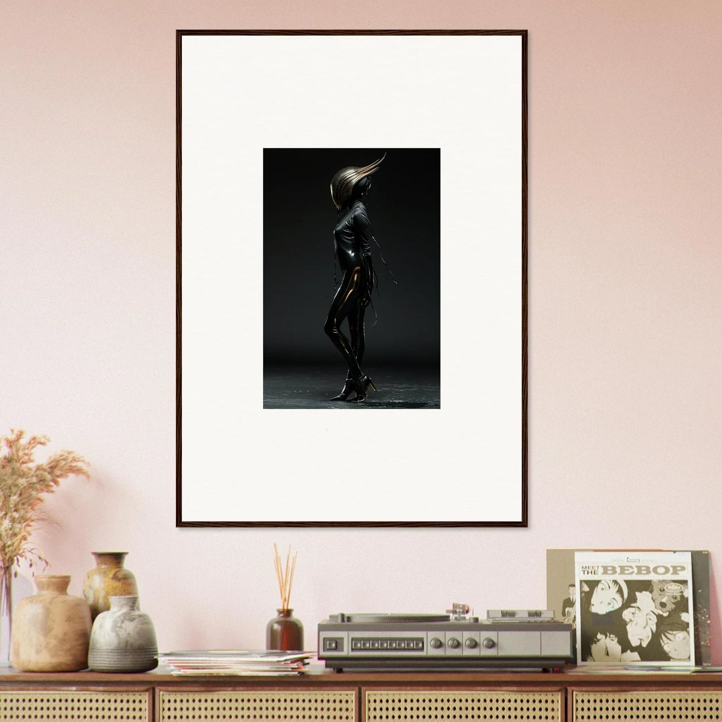 Framed black-and-white photograph of a silhouetted figure in a dramatic pose.
