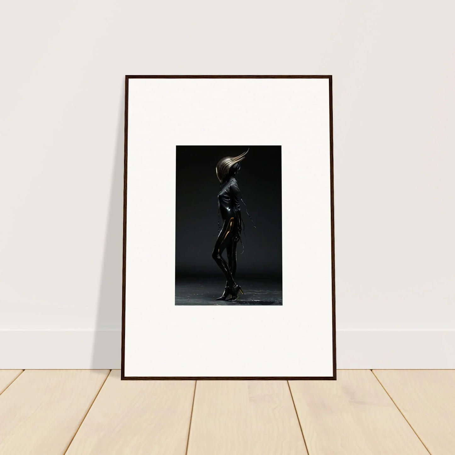Framed black and white photograph of a figure in a dynamic pose.