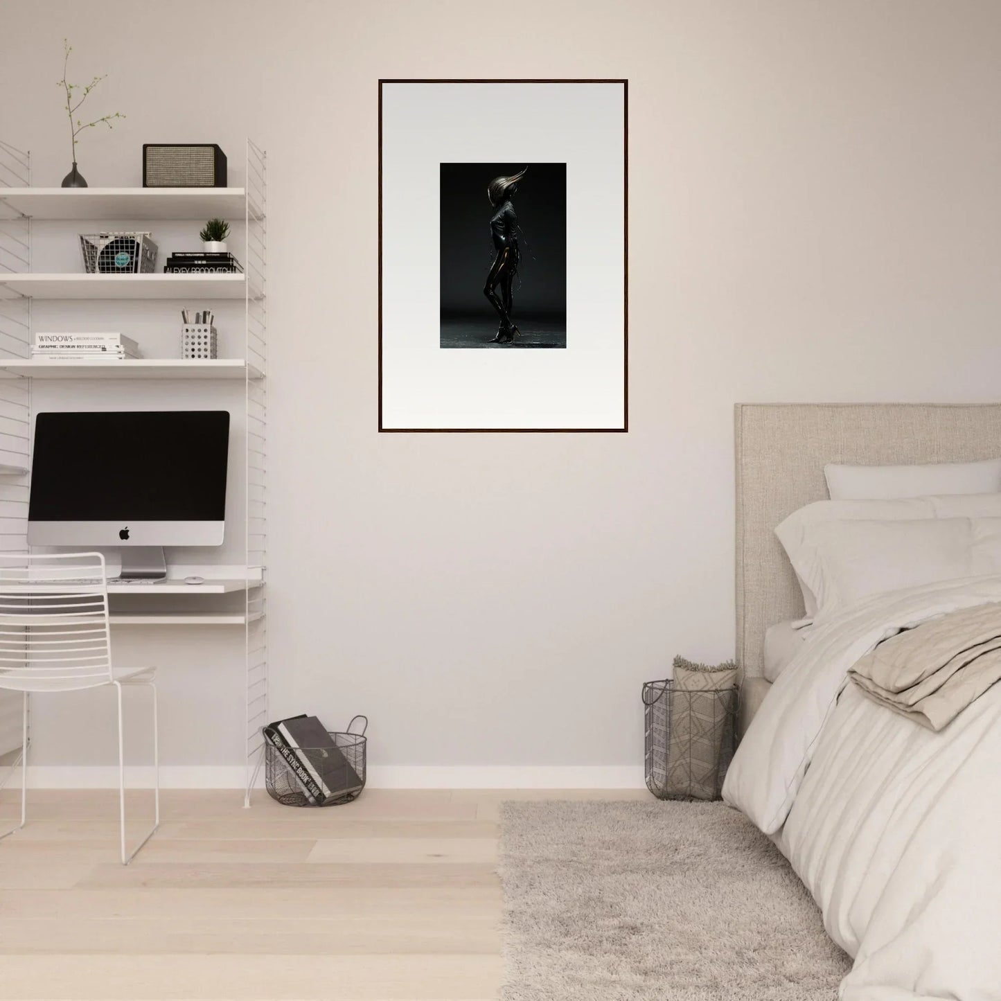 Minimalist bedroom with white walls, floating shelves, and a framed black and white photograph.