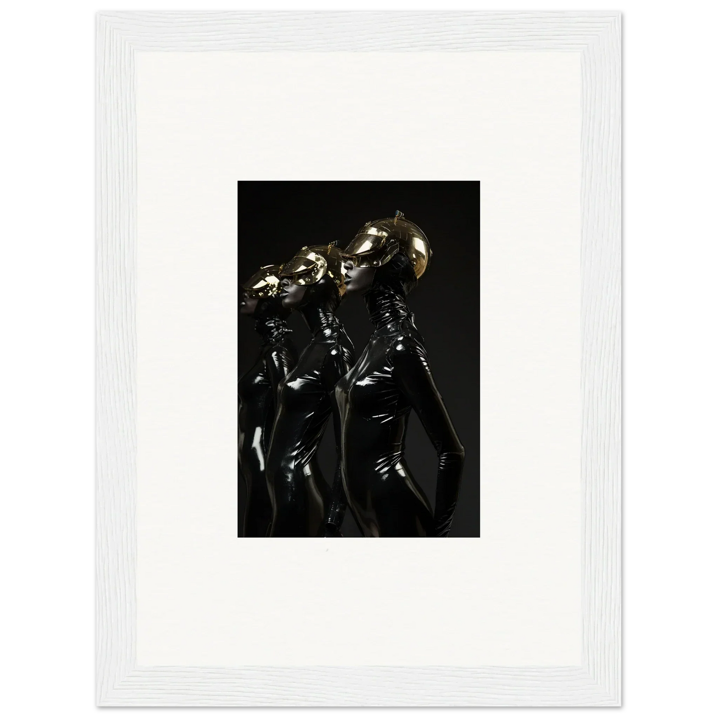 Framed photograph of two figures in shiny, dark outfits standing close together.
