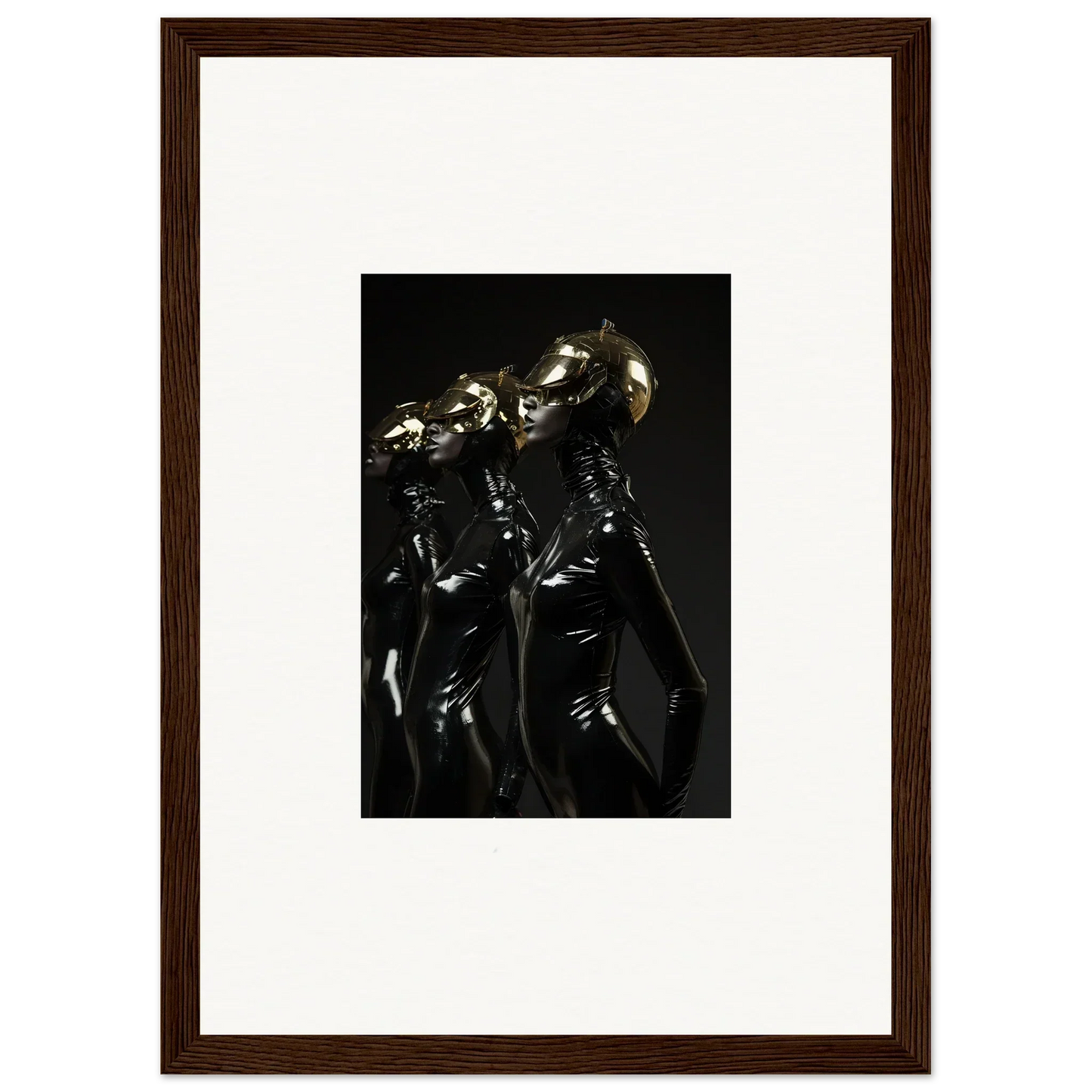 Framed photograph of shiny metallic humanoid figures in dark, dramatic lighting.