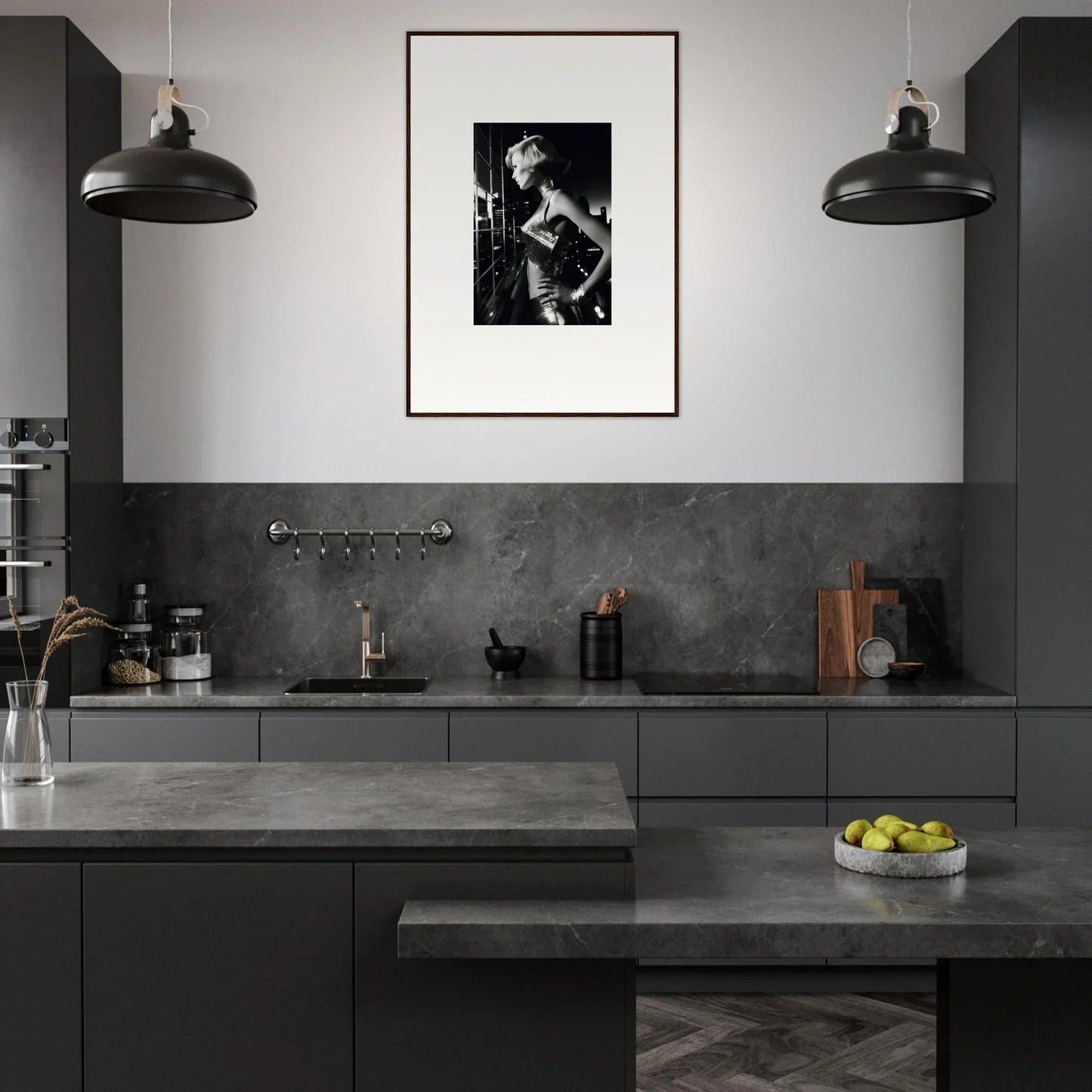 Modern, sleek kitchen with dark cabinetry and a monochrome color scheme.