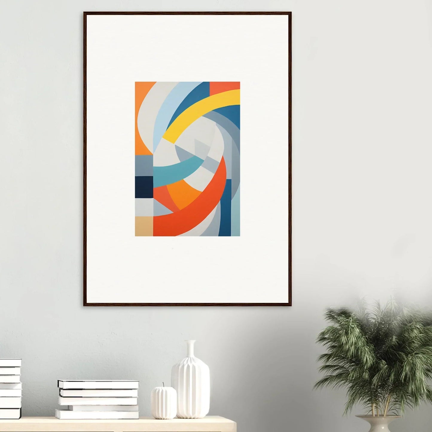 Framed abstract art of curved shapes in orange, blue, and yellow for Tangerine Cosmic Spiral