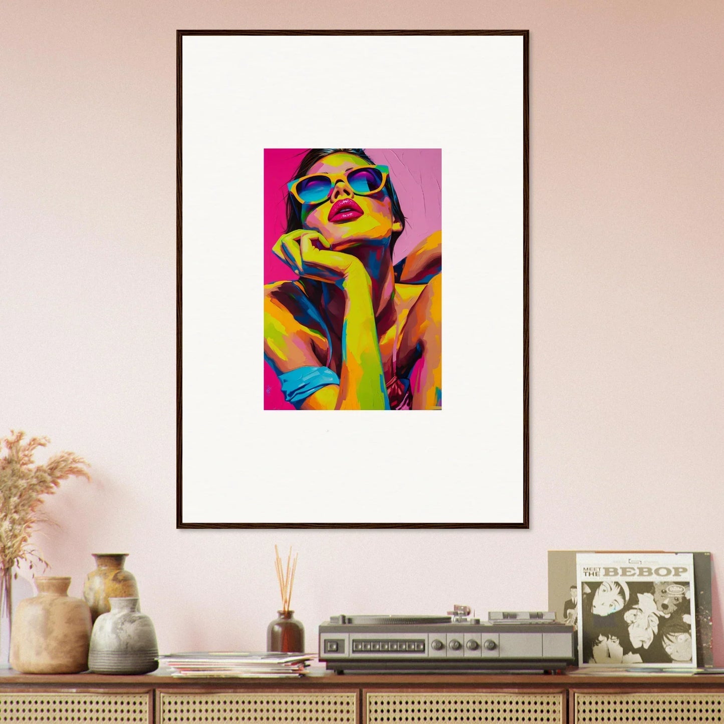 Framed wall art of a colorful pop art portrait for vibrant room decor