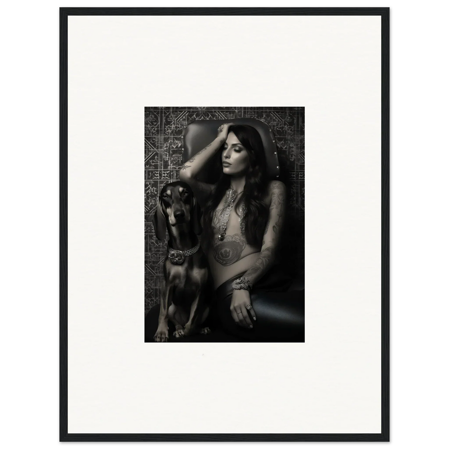 Black and white photograph of a woman posing with a dog.
