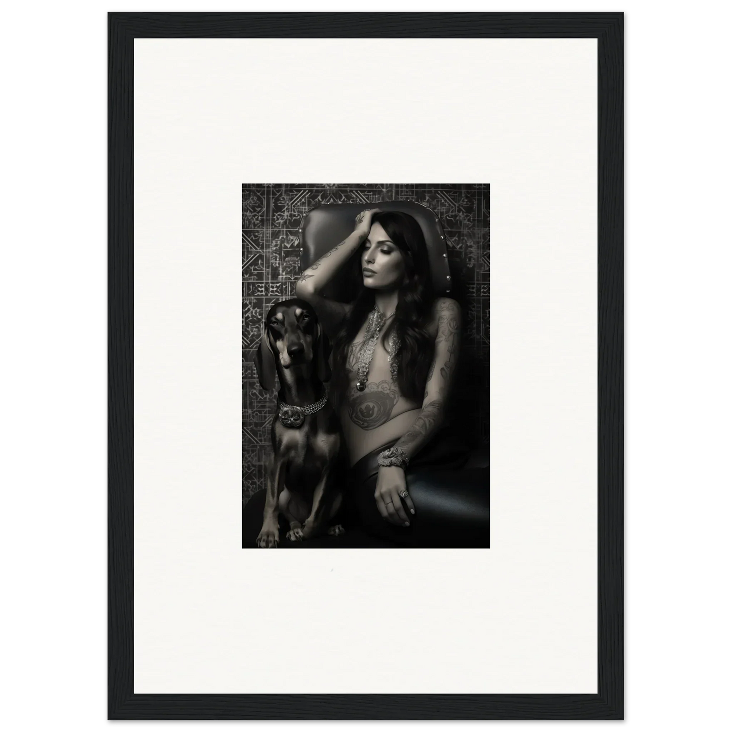 Black and white photograph of a woman posing with a dog.