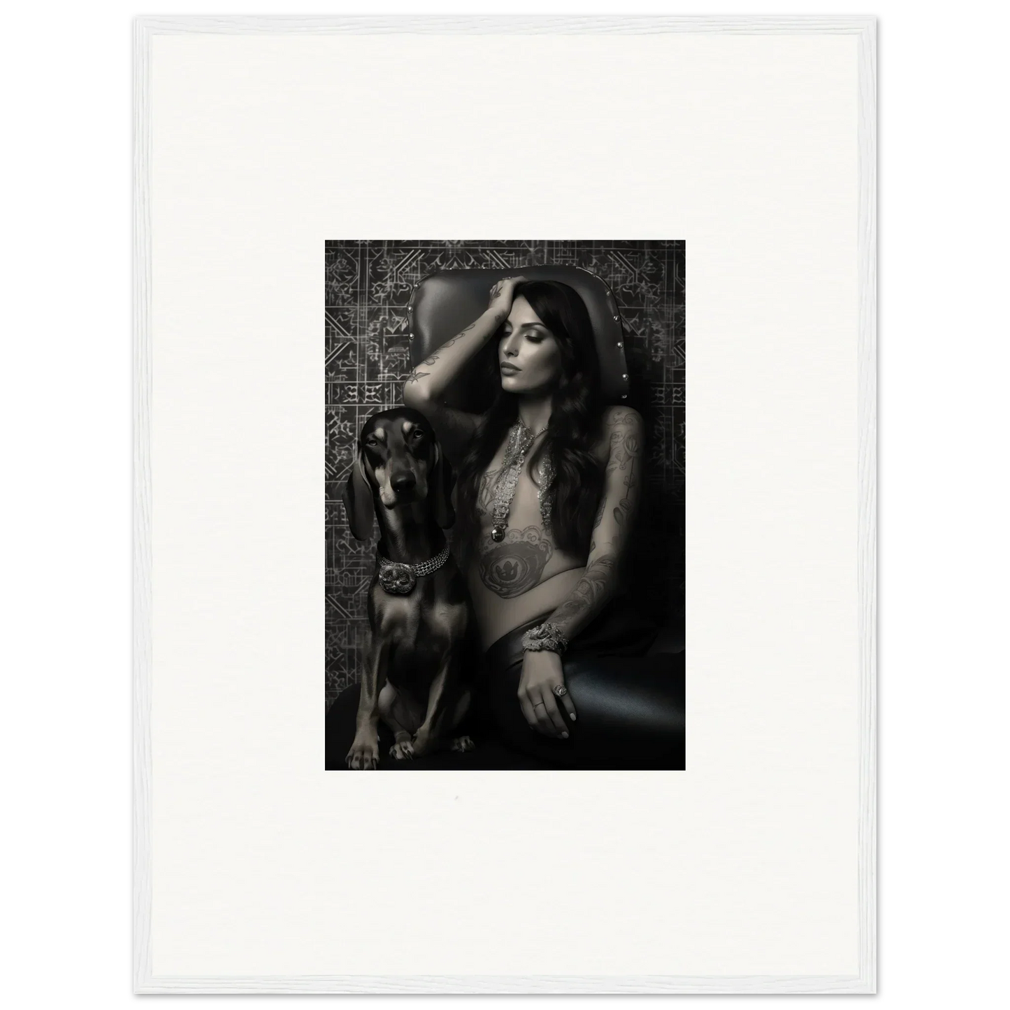 Black and white photograph of a woman posing with a dog.