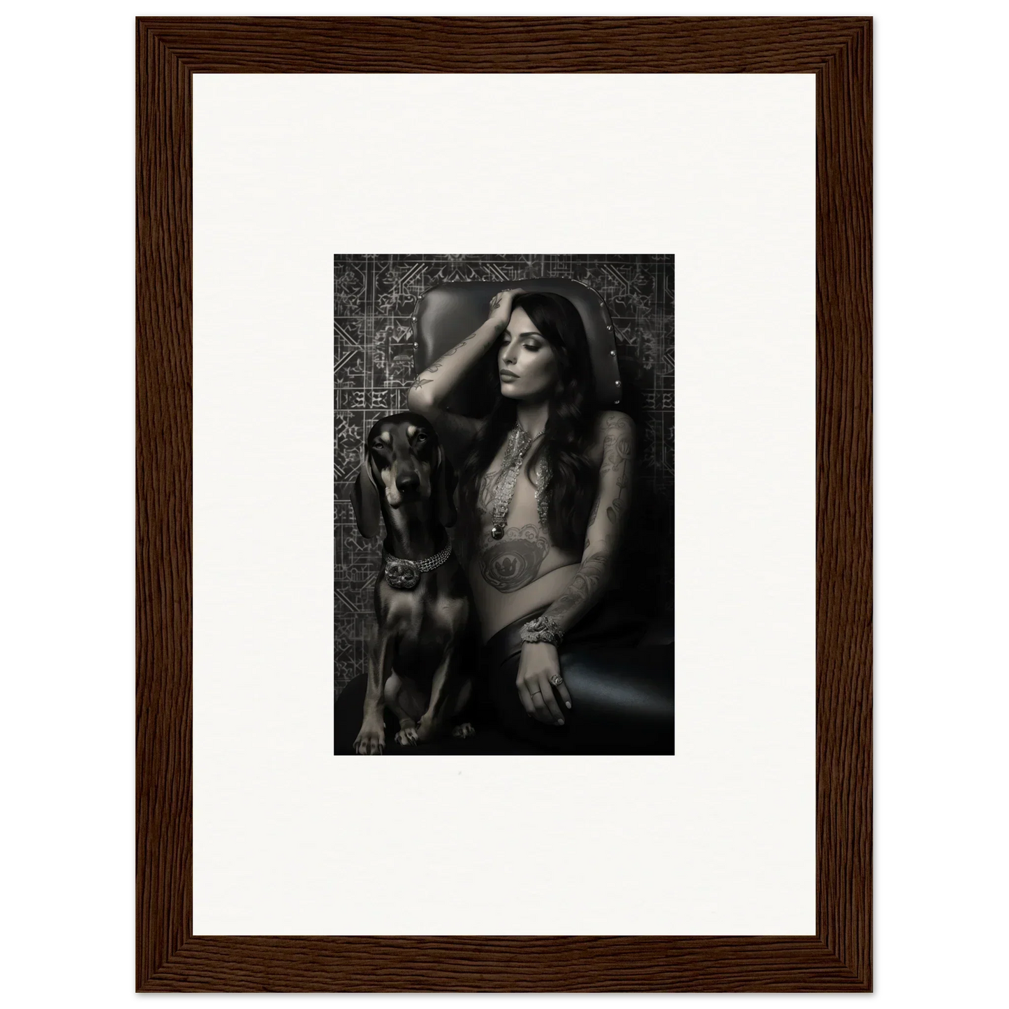 Framed black and white photograph of a woman posing with a dog.