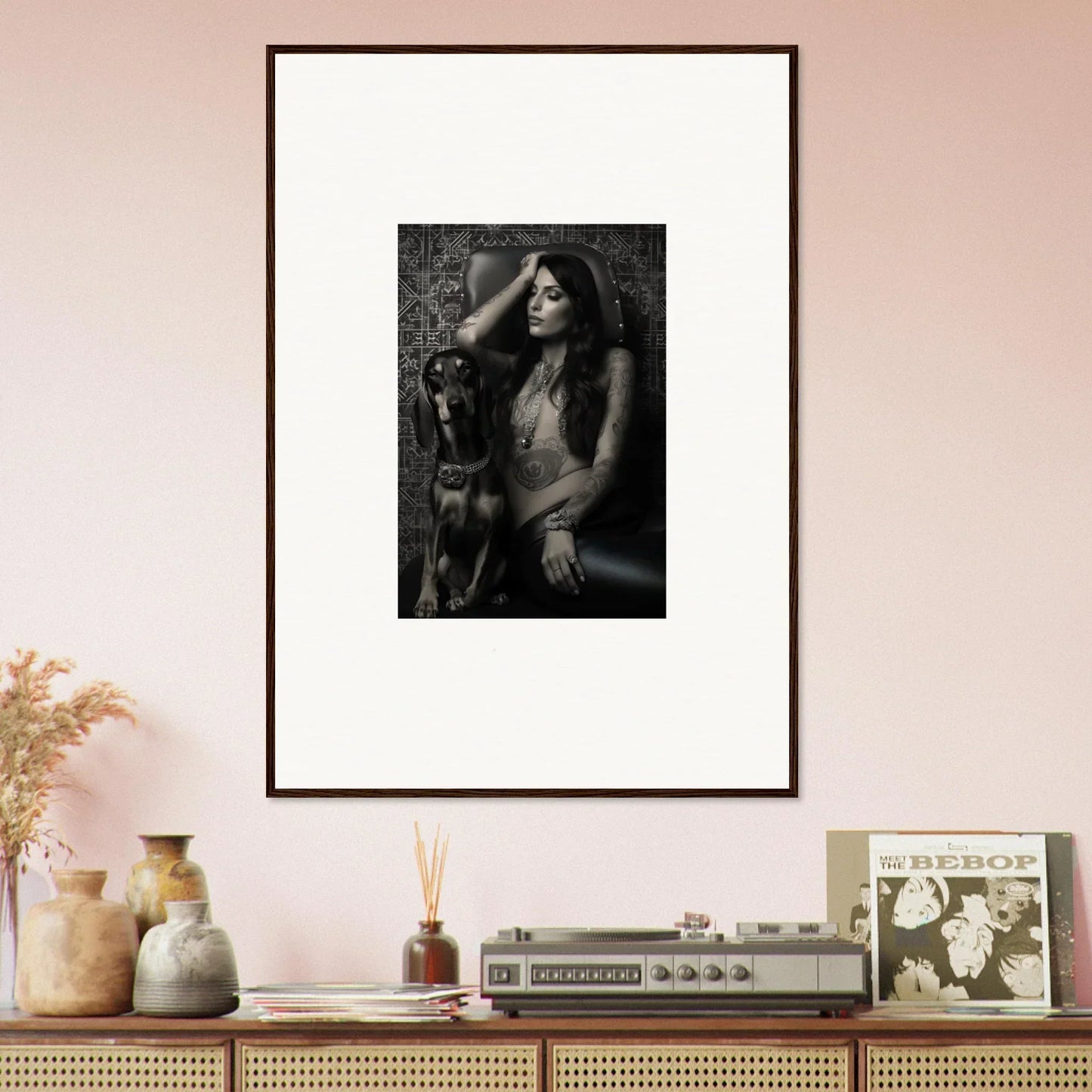 Framed black and white photograph of a woman with long hair posing dramatically.