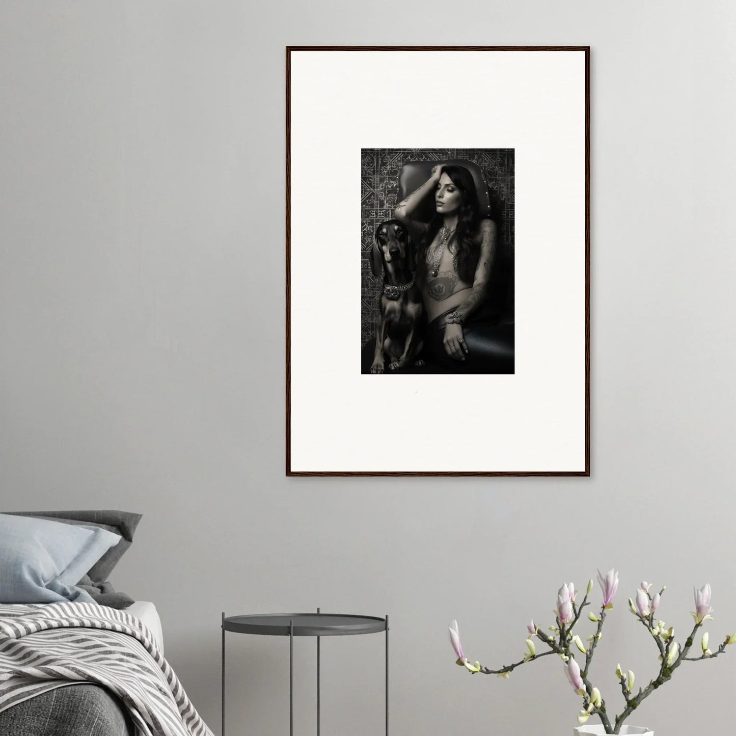 Framed black and white portrait photograph of a person with long dark hair.