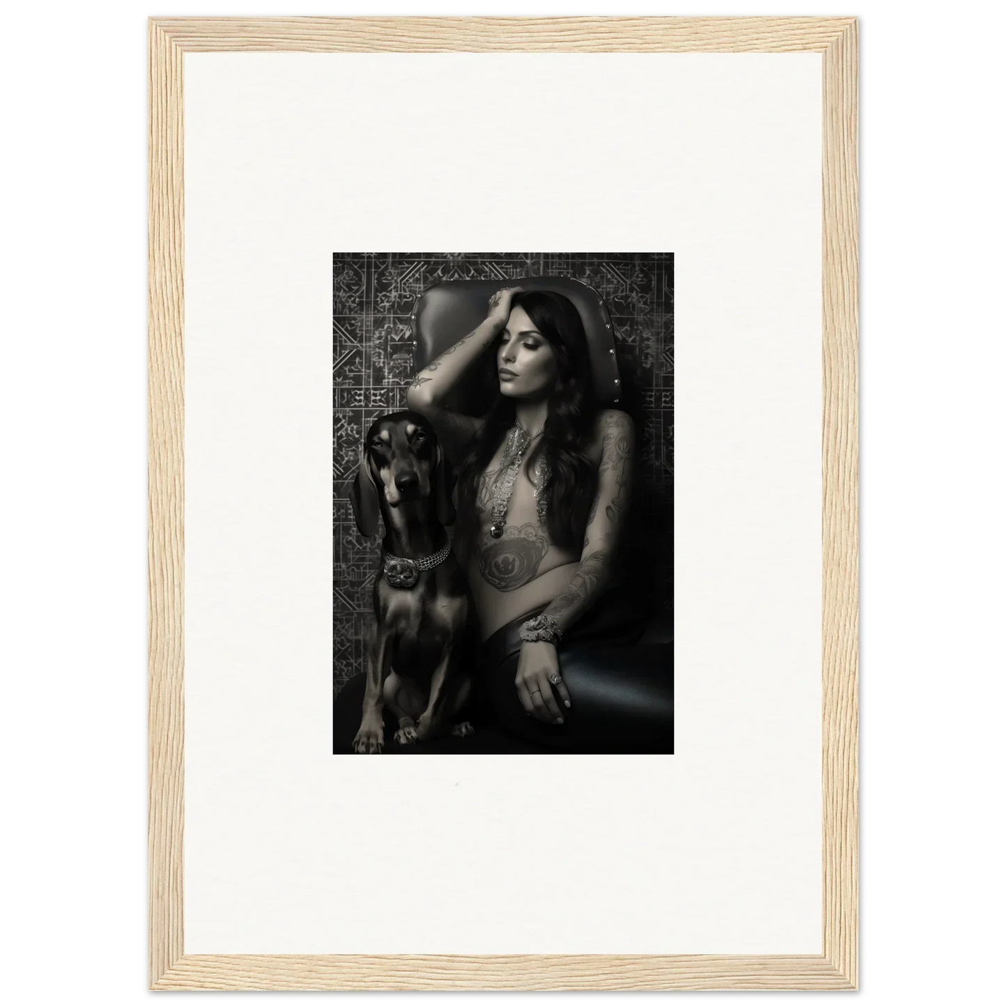 Framed black and white photograph of a woman posing with a dog.