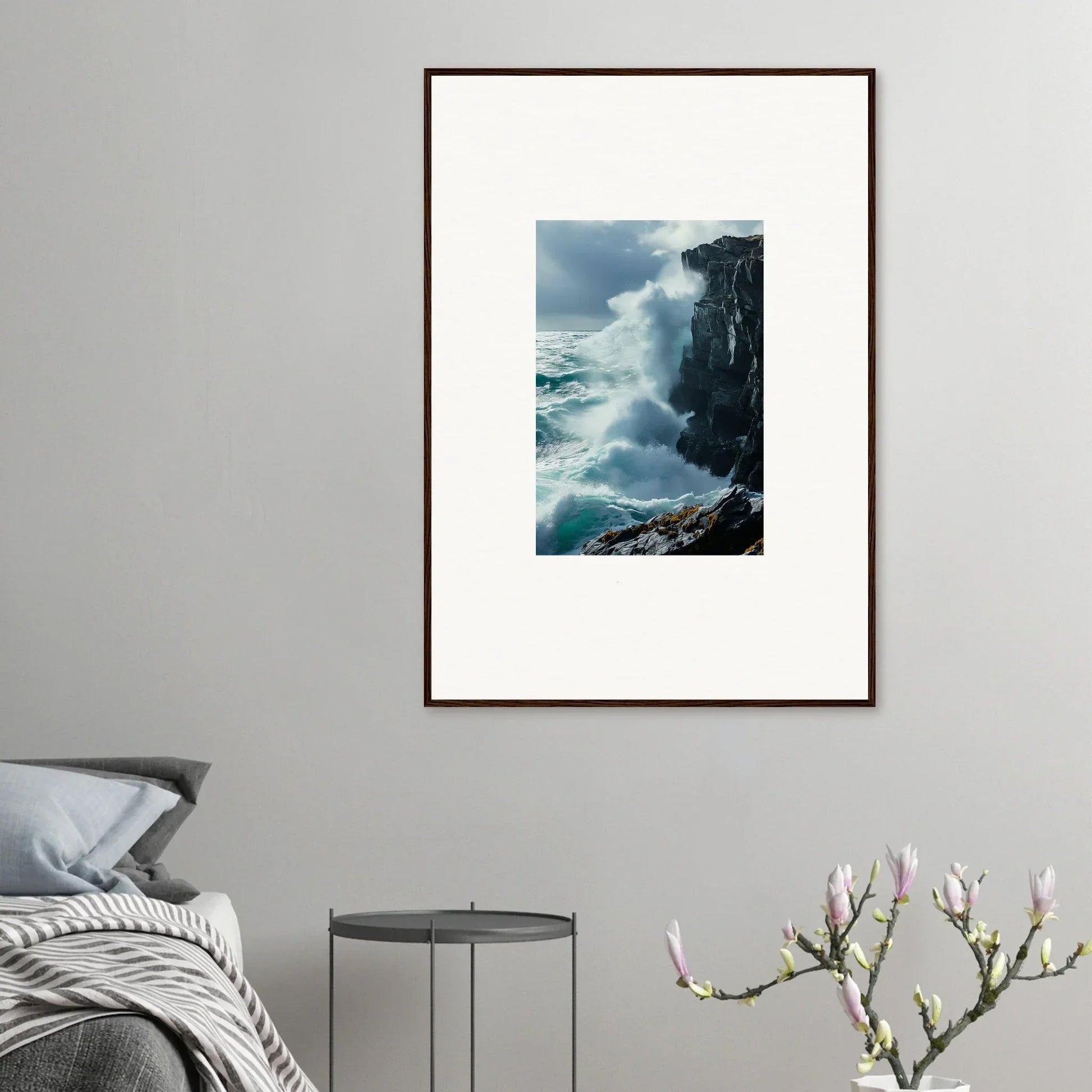 Framed photograph of crashing waves on rocky cliffs for serene room decoration