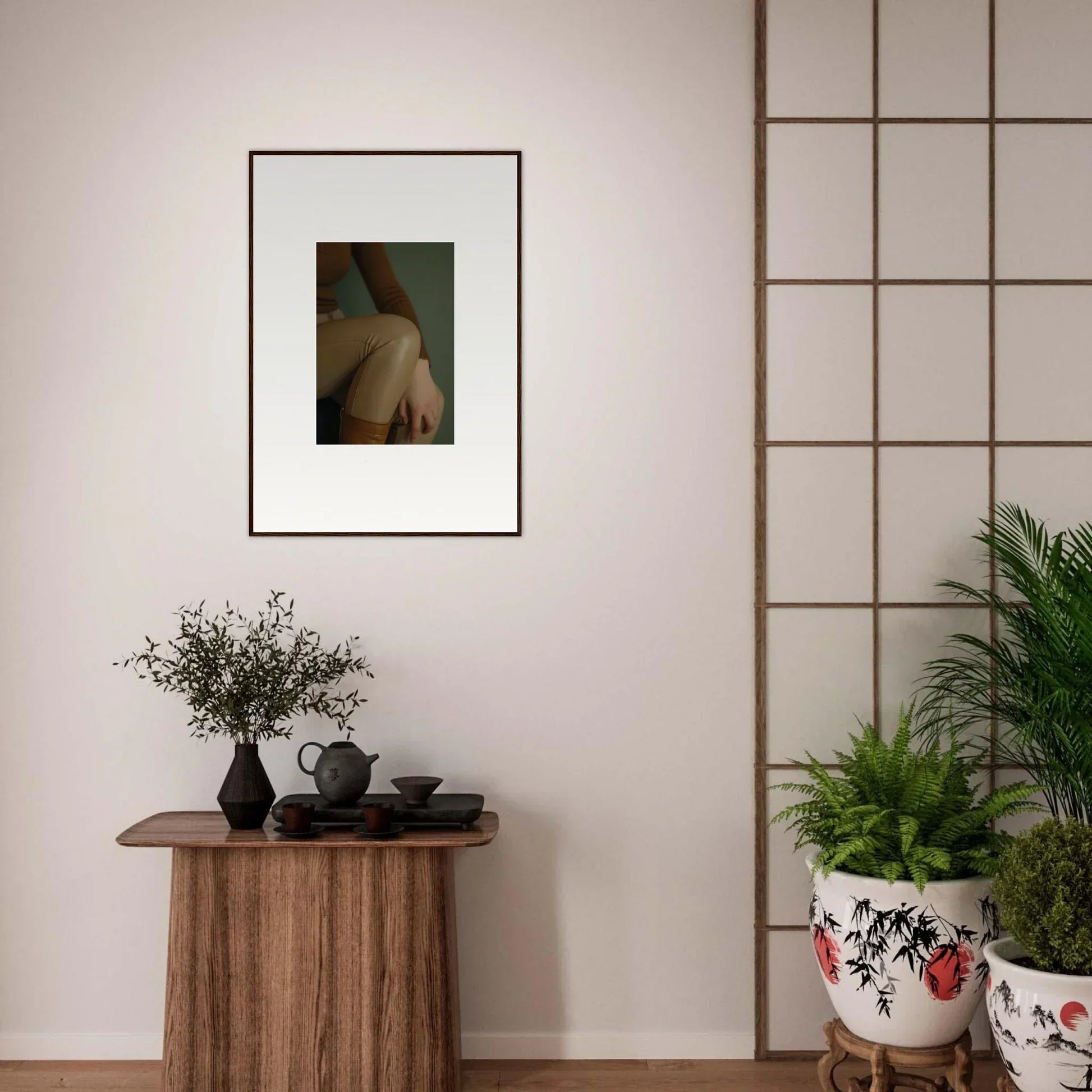 Framed photograph of a person’s bare back and shoulder.