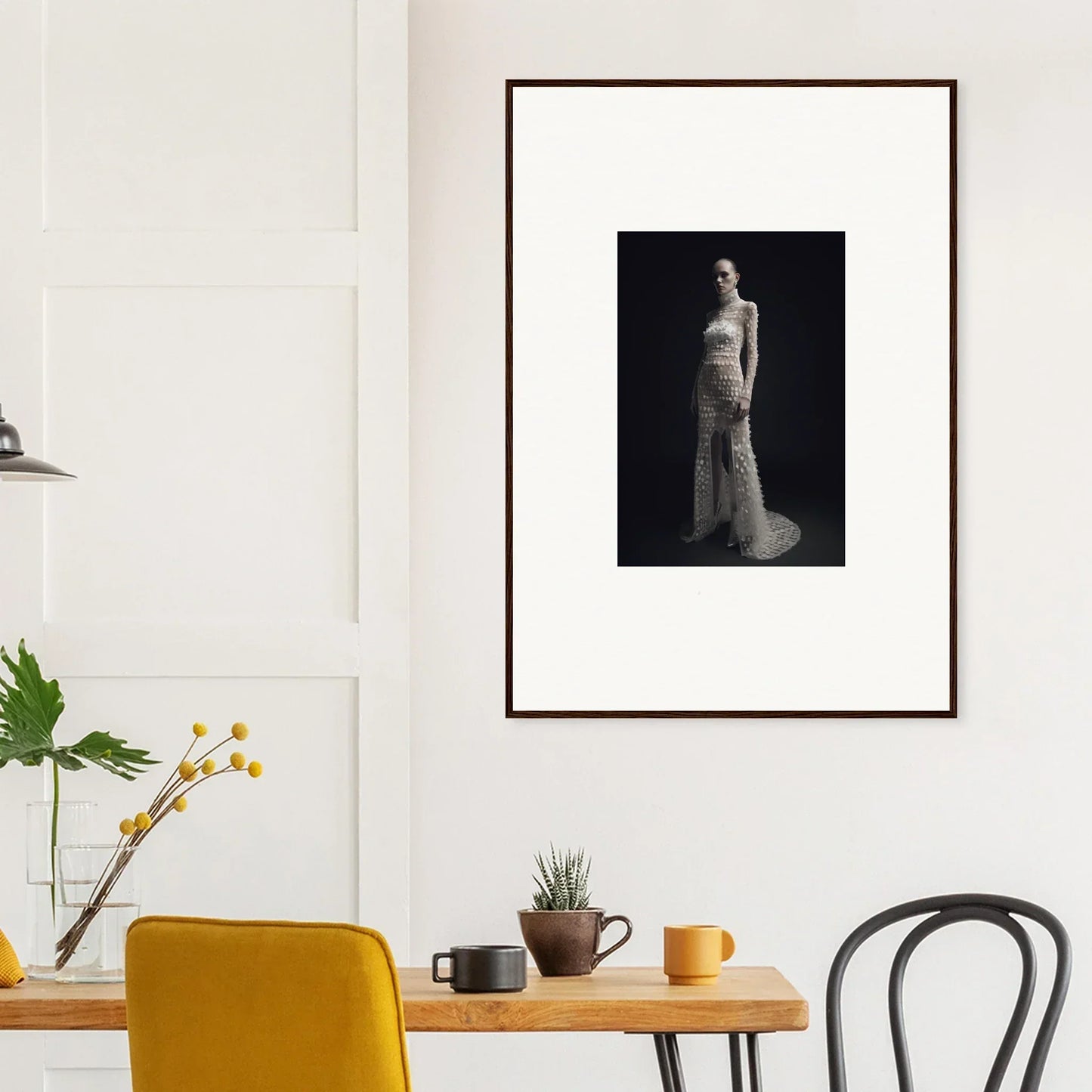 Framed black and white photo of a person in a long dress for Nuit Spectrale room decoration