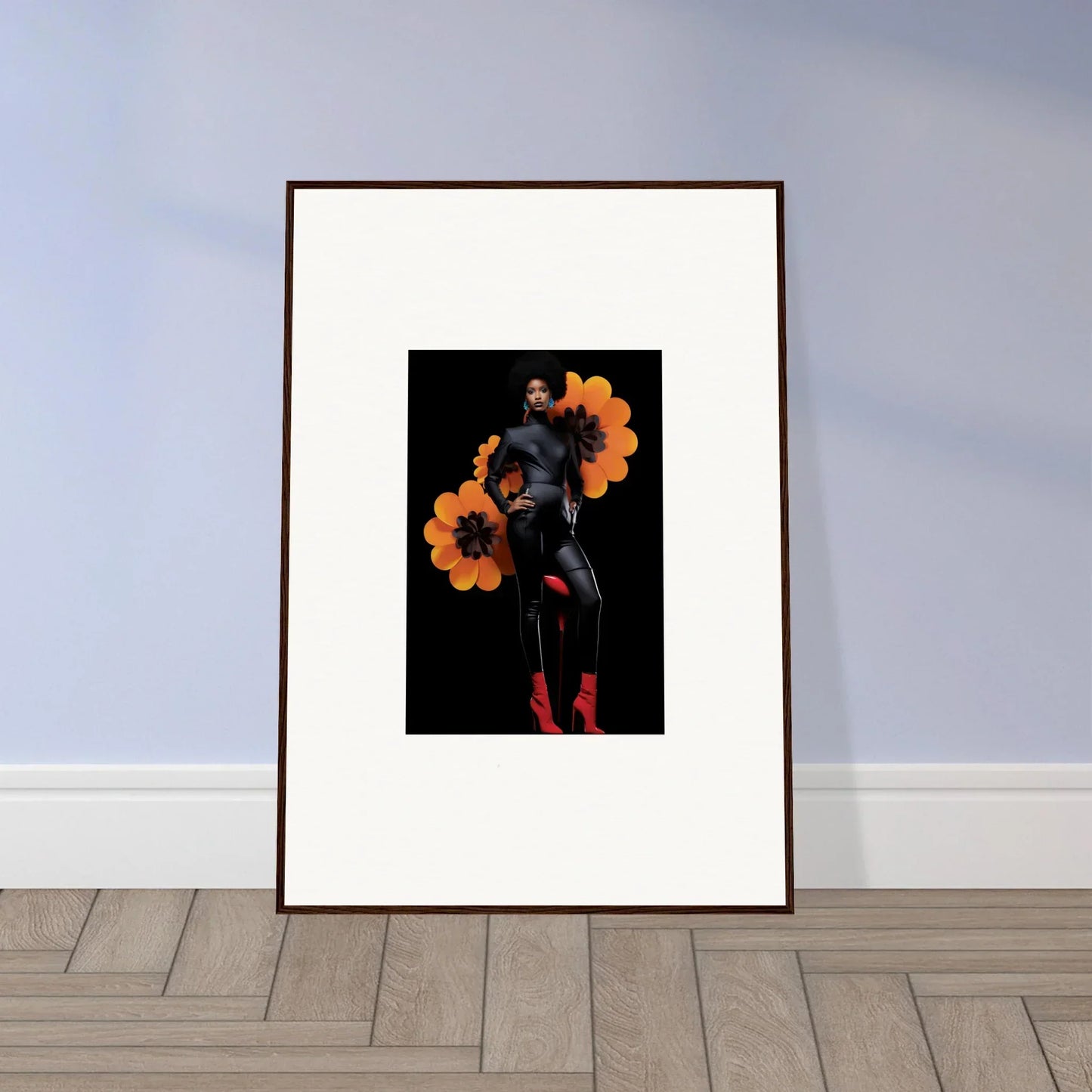 Framed canvas print of Blossom Elegy, featuring an orange floral figure on dark background