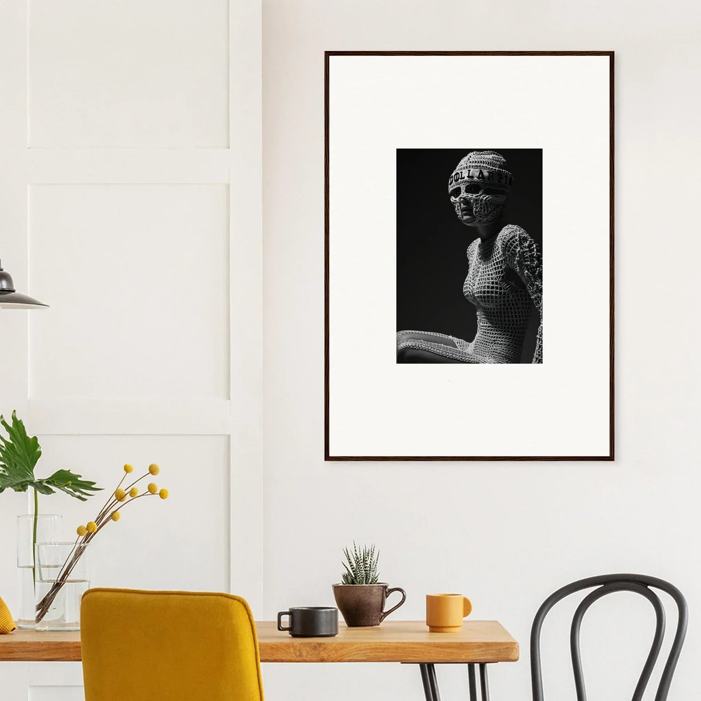 Framed black and white photograph of an ancient Egyptian-style bust sculpture.