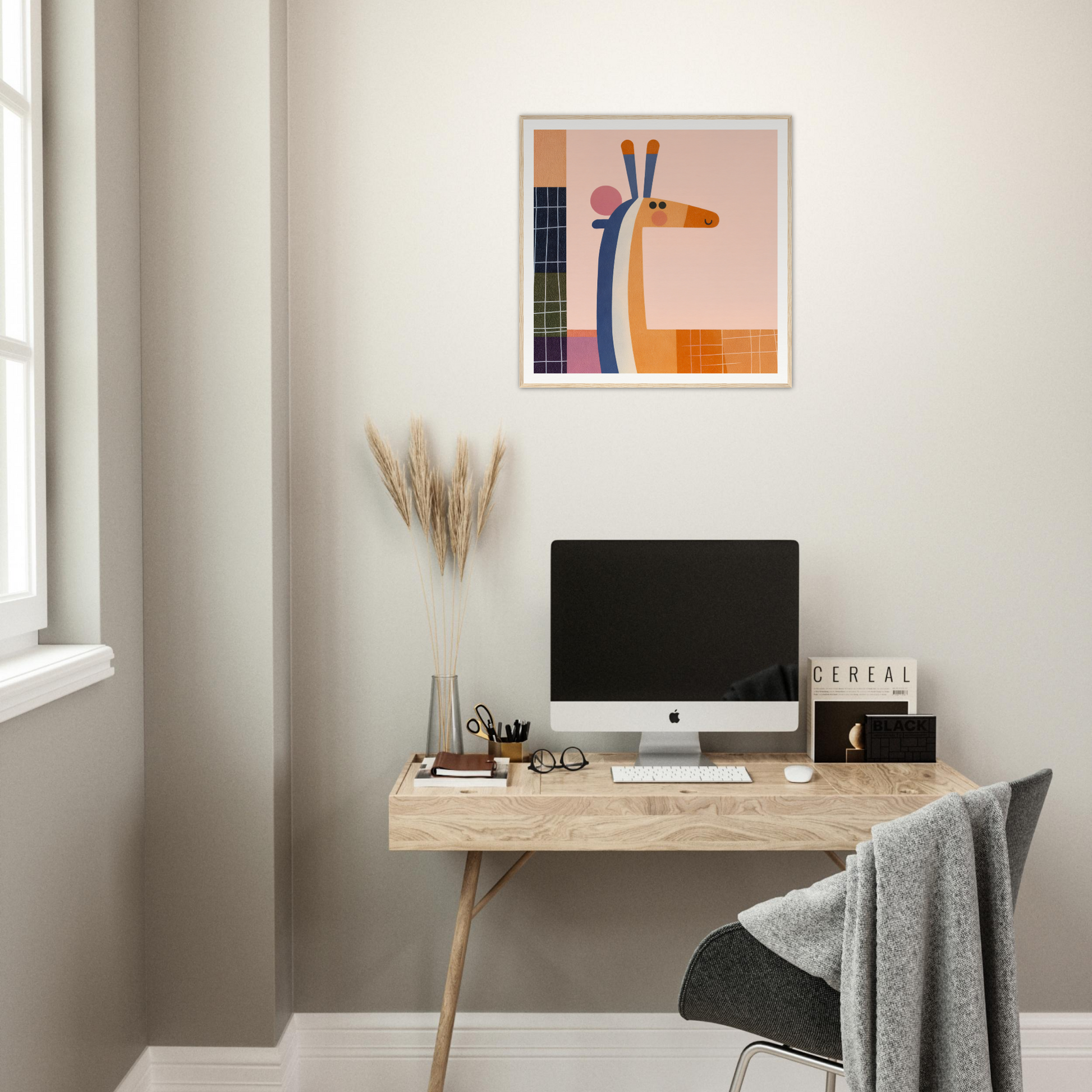 Modern iMac on light wooden desk in Whimsical Geometry Safaris special edition art