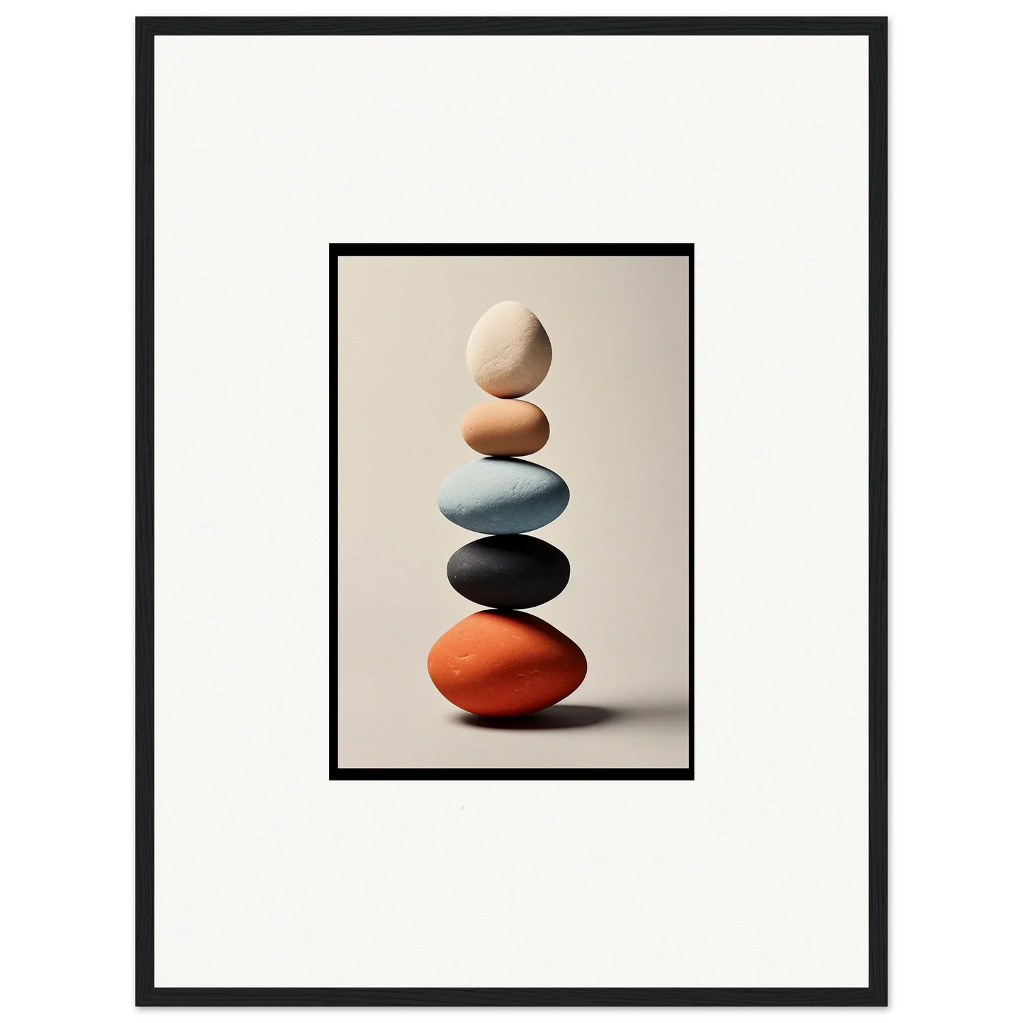 Balanced colorful stones for unique room decor or framed wall art