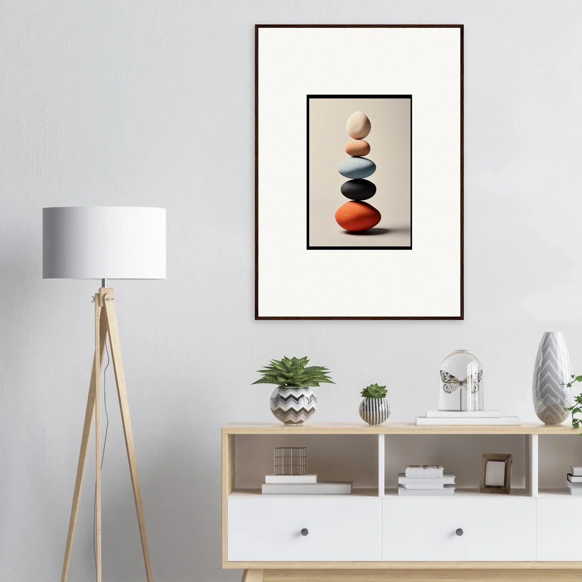 Framed wall art of colorful balanced stones, perfect for unique room decor