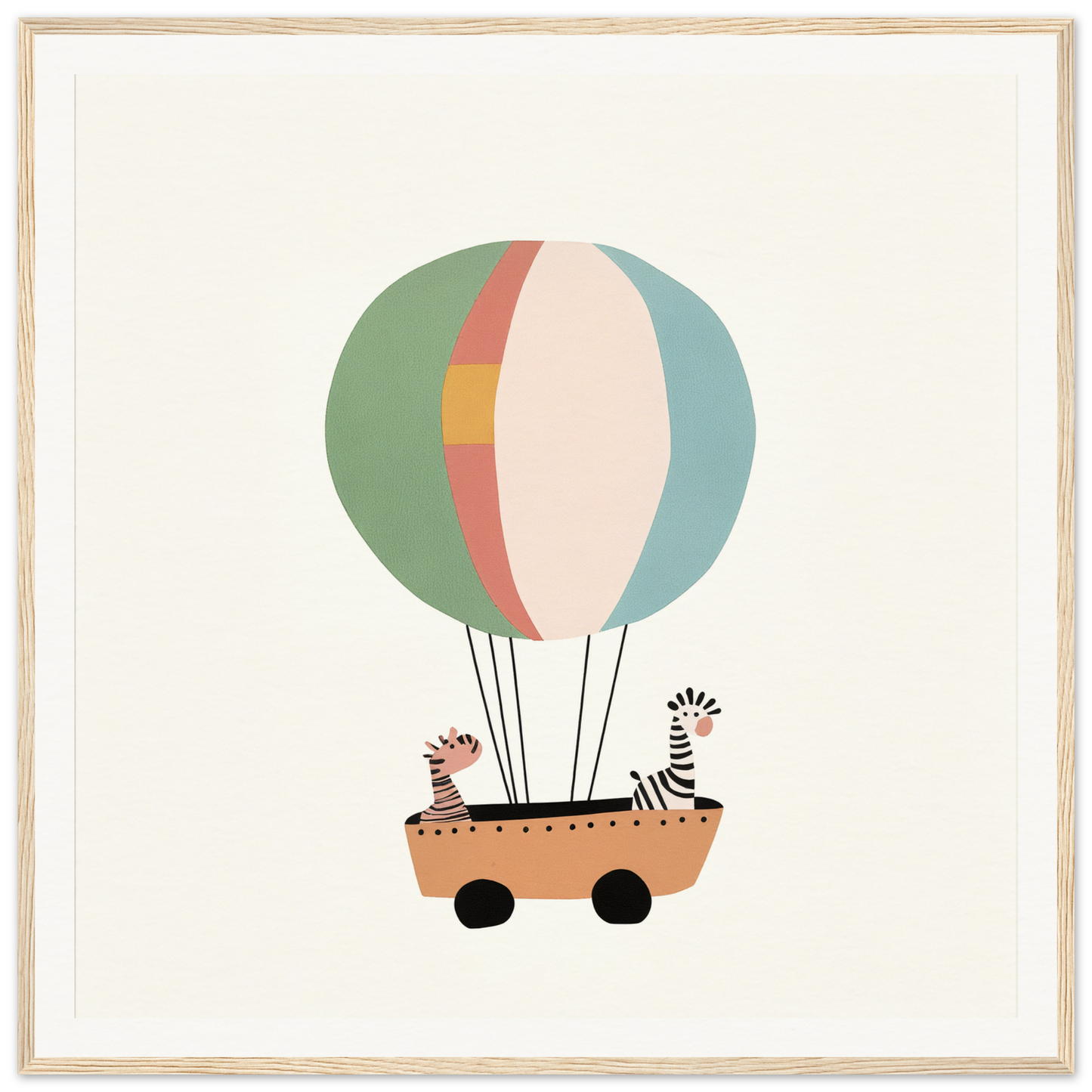 Striped hot air balloon on a cart with zebras at Zany Zebra Odyssey attraction