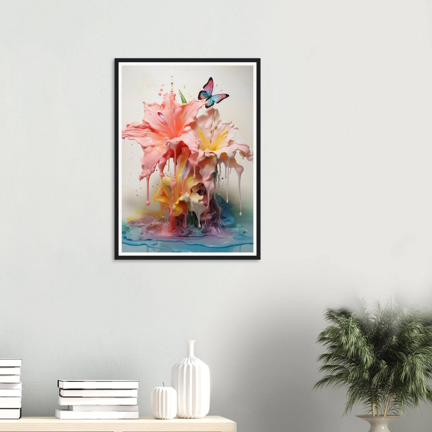 A framed print of a pink flower with a blue butterfly