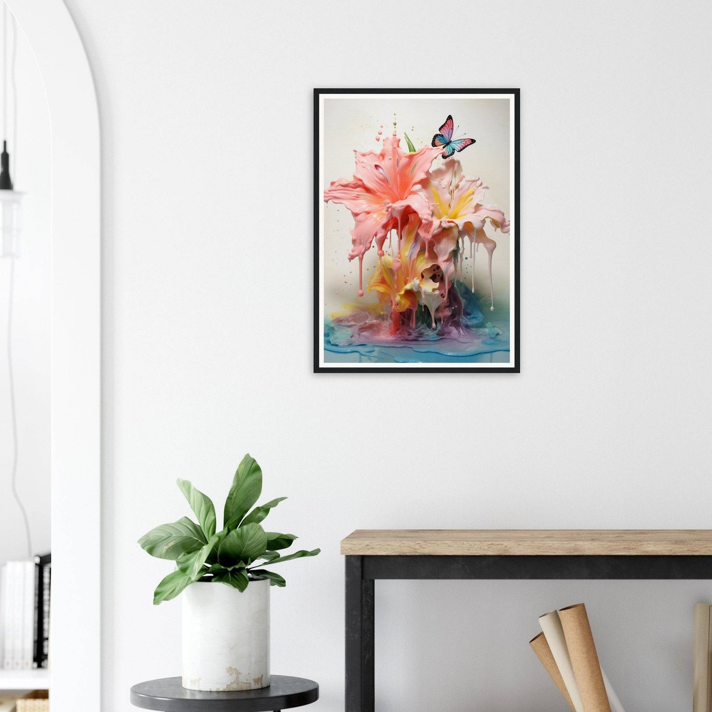 A framed print of a pink flower with a butterfly on it