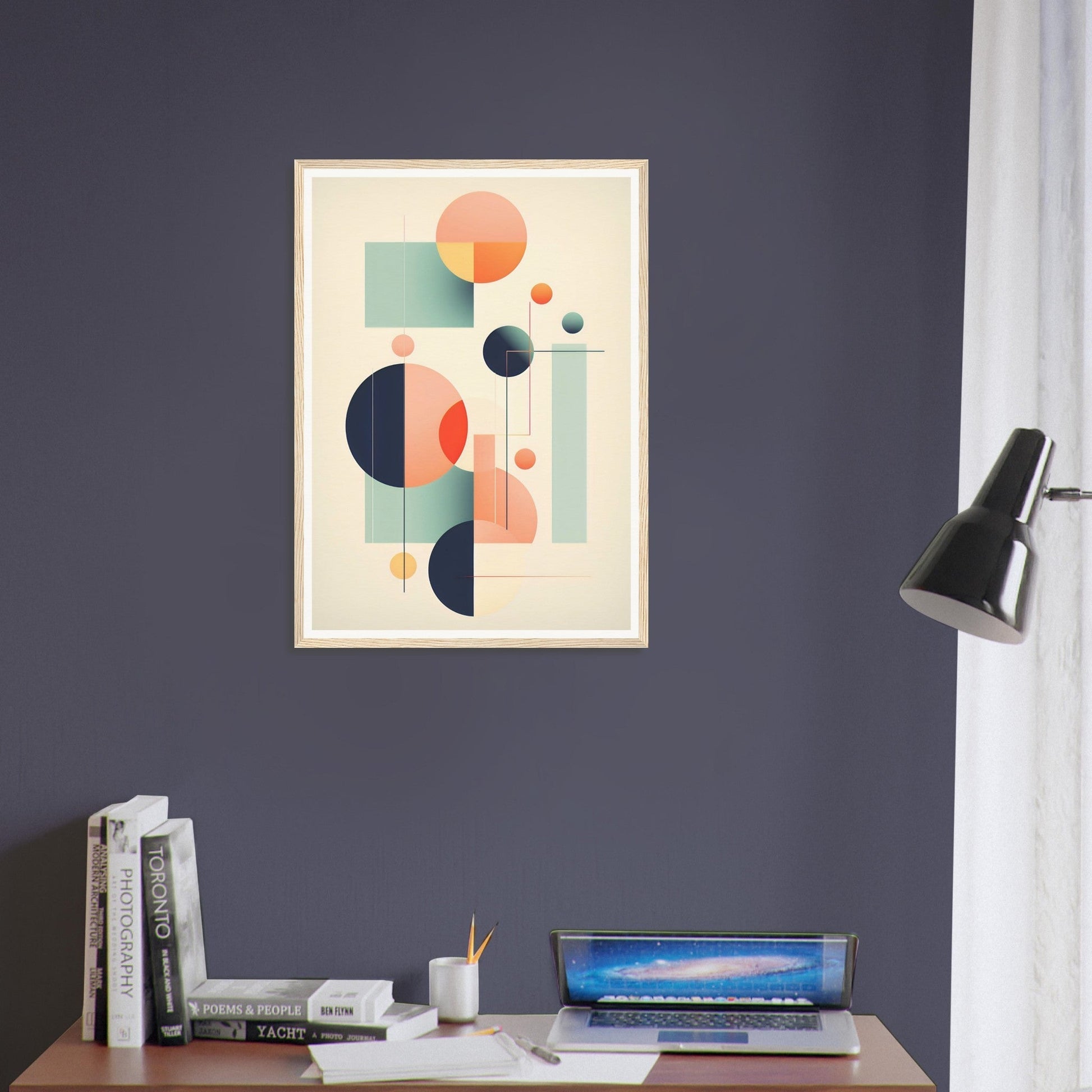 A framed print on a wall above a desk