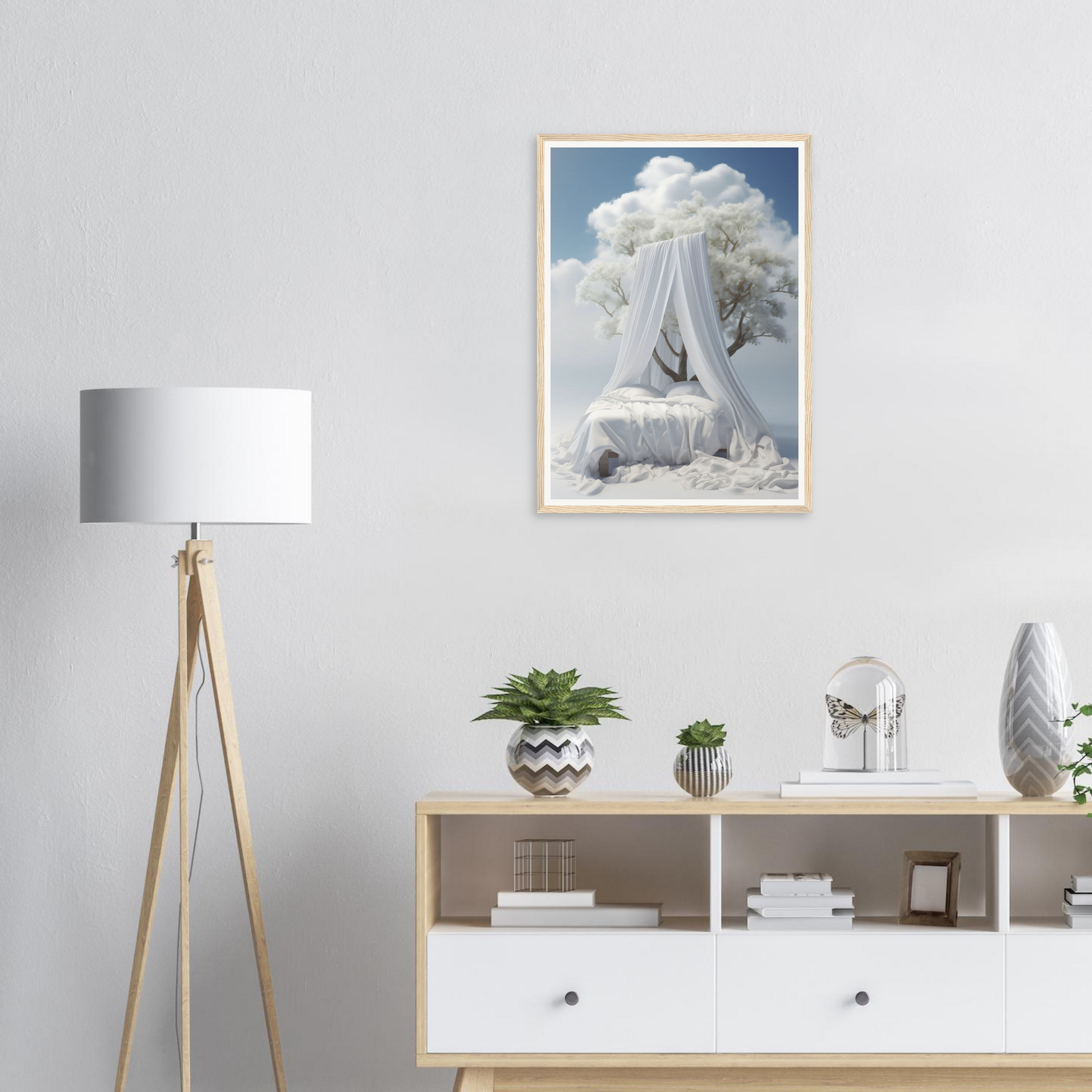 A framed print of a white statue with clouds in the background