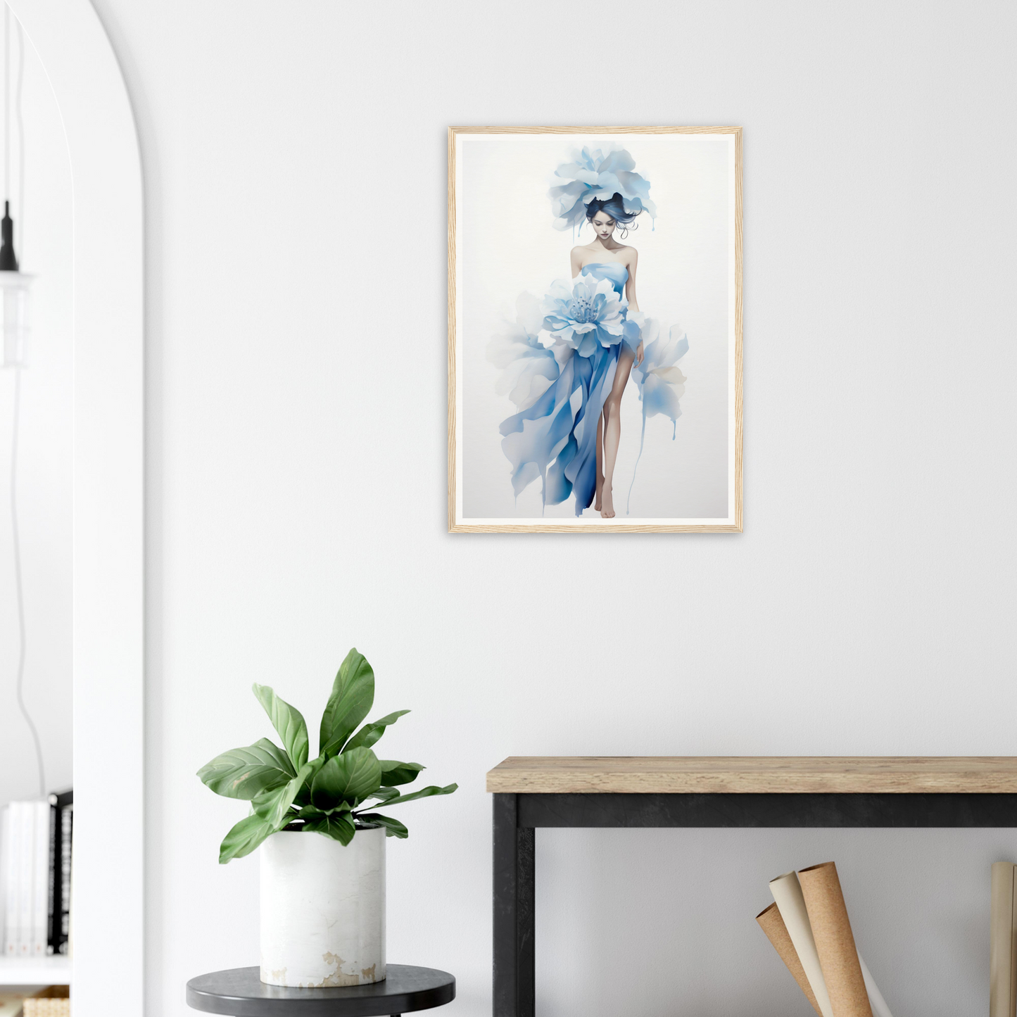 A framed print of a woman in a blue dress