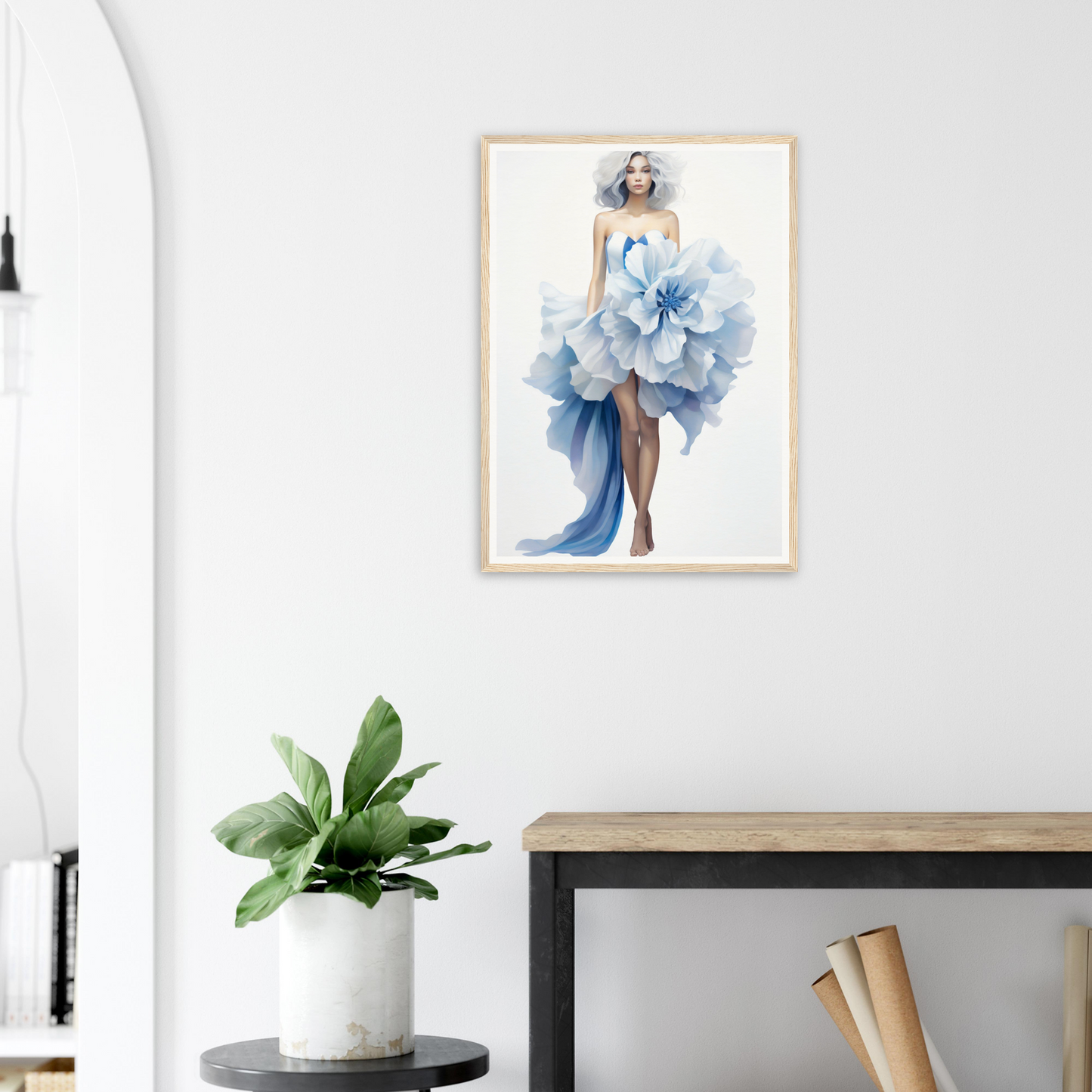 A framed print of a woman in a blue dress